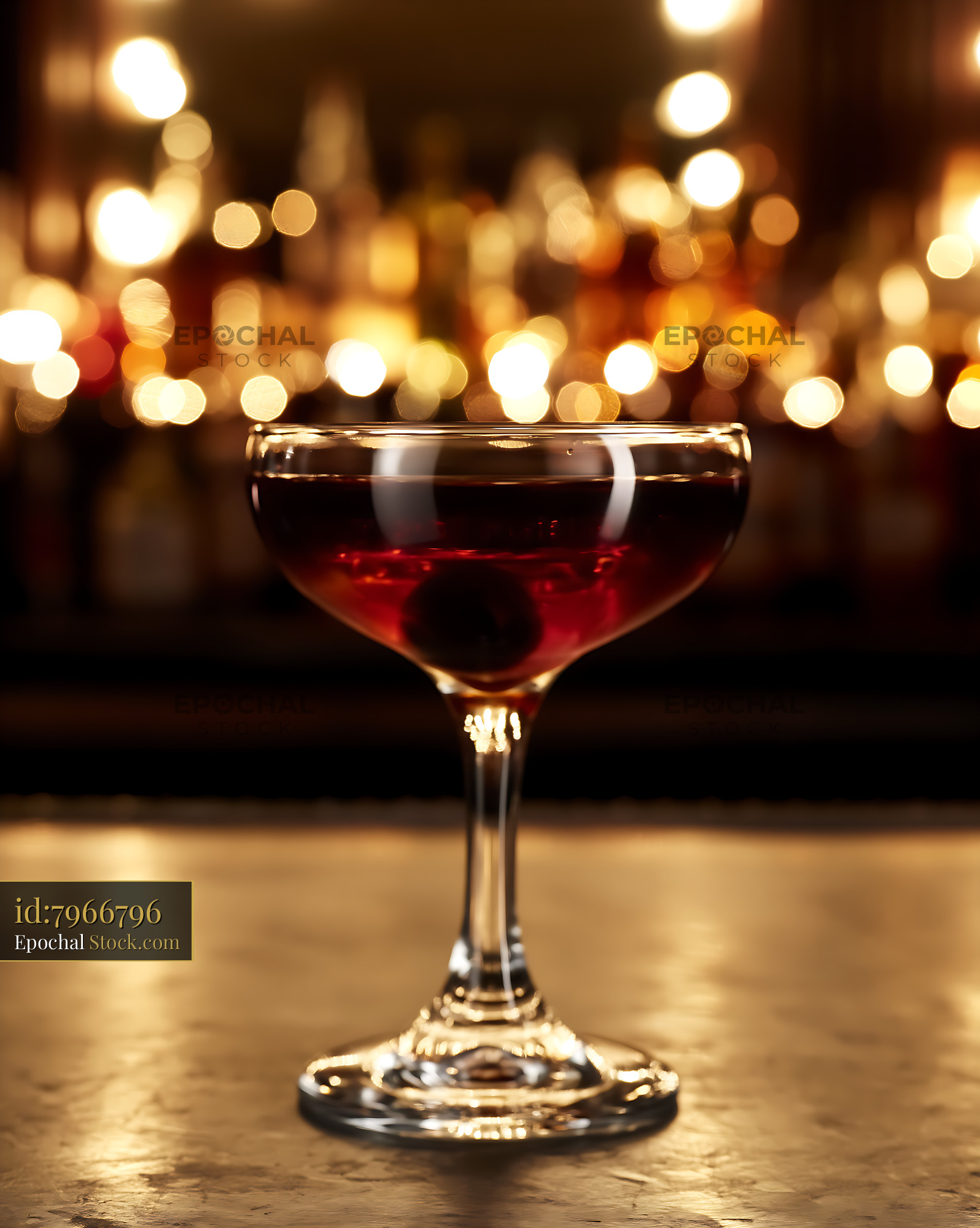 Bushwick Cocktail with Cherry Garnish at Bar - stock photo