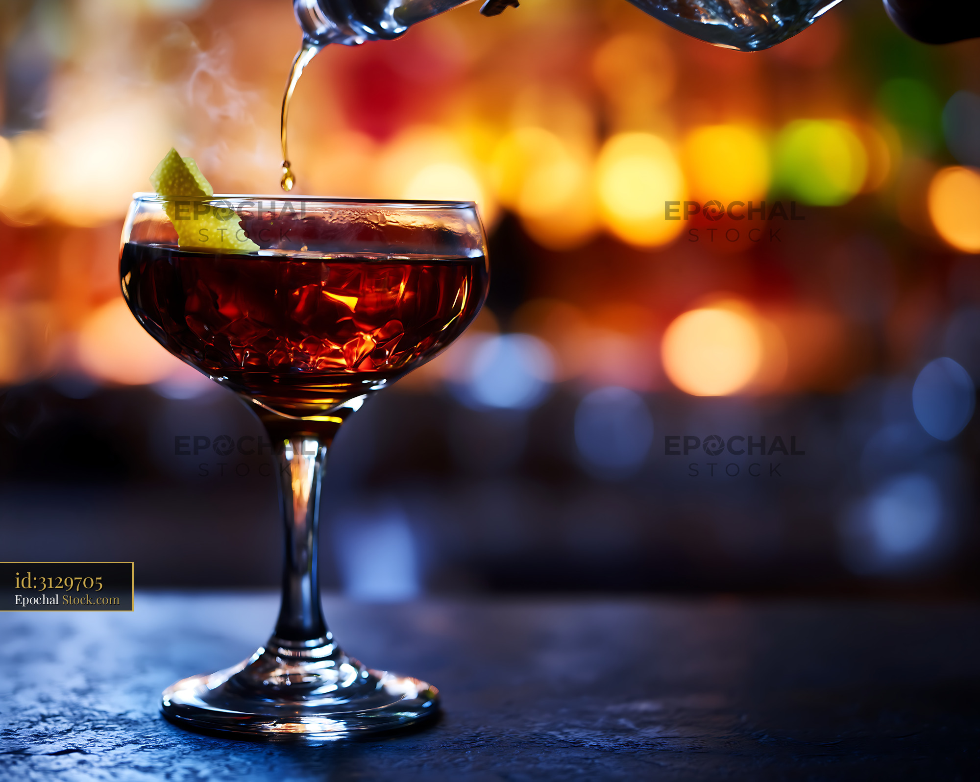 Bushwick Cocktail Being Poured into Coupe Glass - stock photo