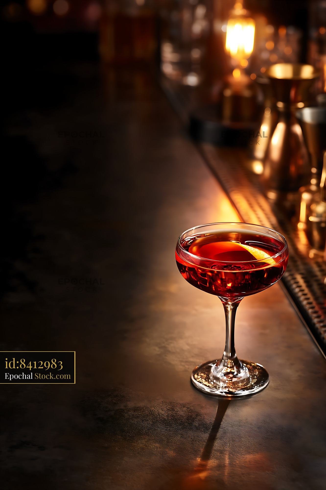 Saratoga Cocktail with Lemon at Bar Counter - stock photo