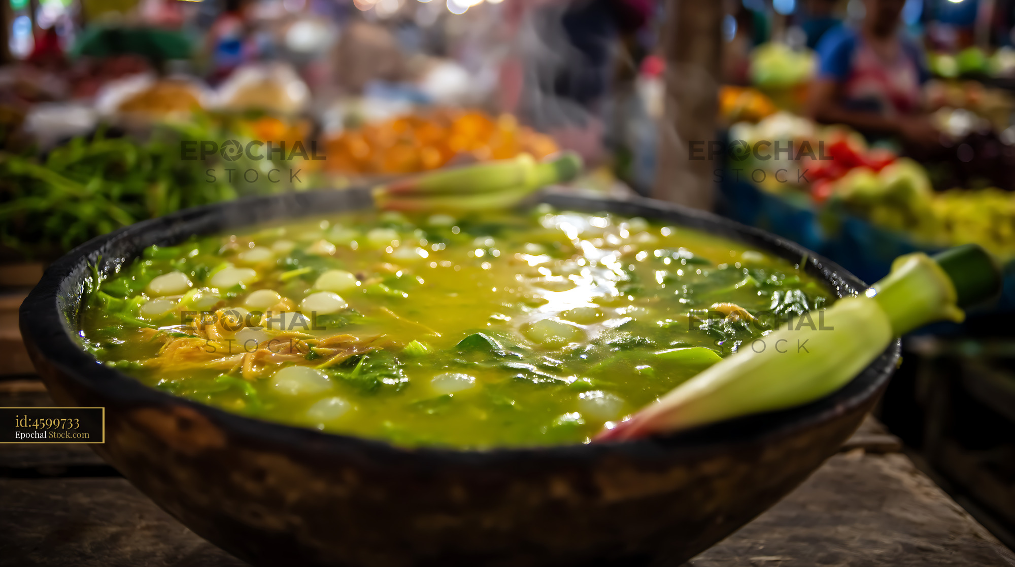 Kapurung Soup Steaming in Bowl at Market Stall - stock photo