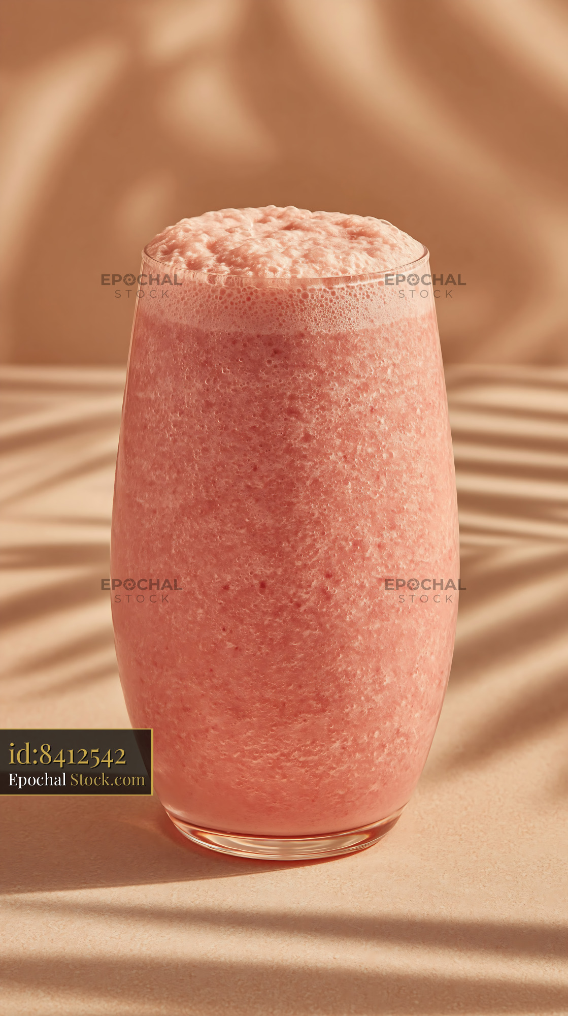 Plum wine cream milkshake in a glass with palm leaf shadows - stock photo