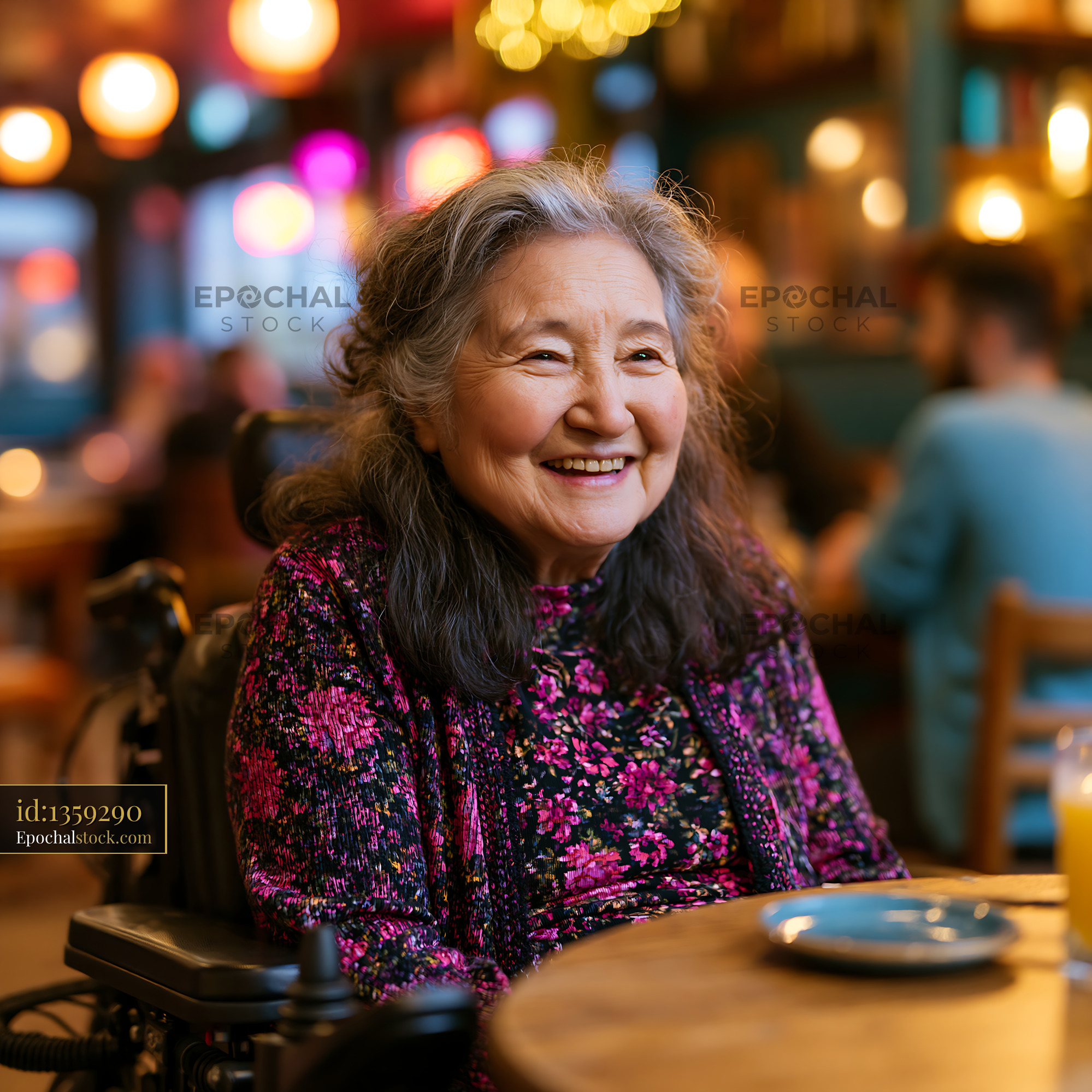 Watermarked full-resolution preview of Older woman smiling in cafe with warm lighting