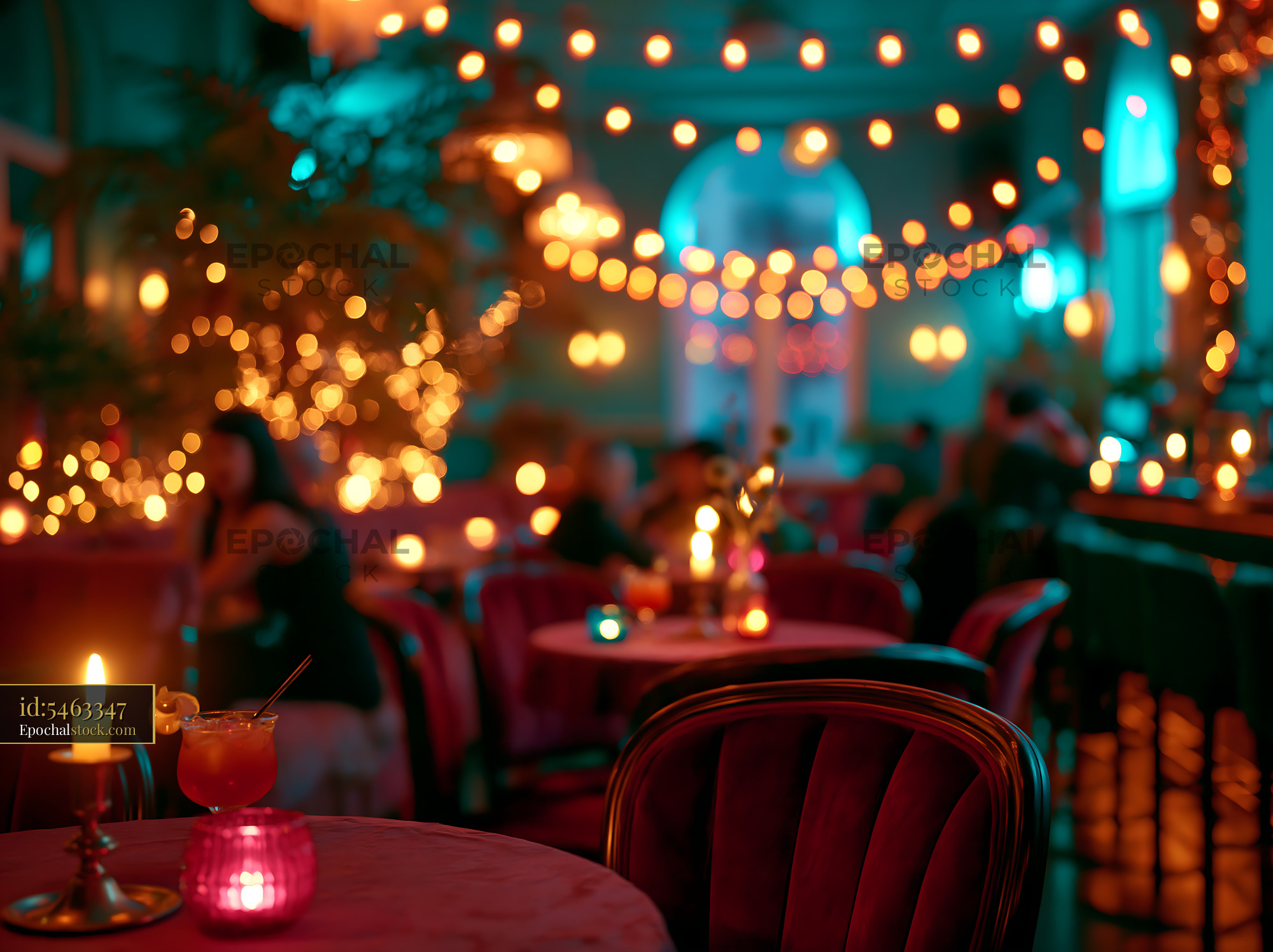 Watermarked full-resolution preview of Cozy evening atmosphere in a warm-lit restaurant