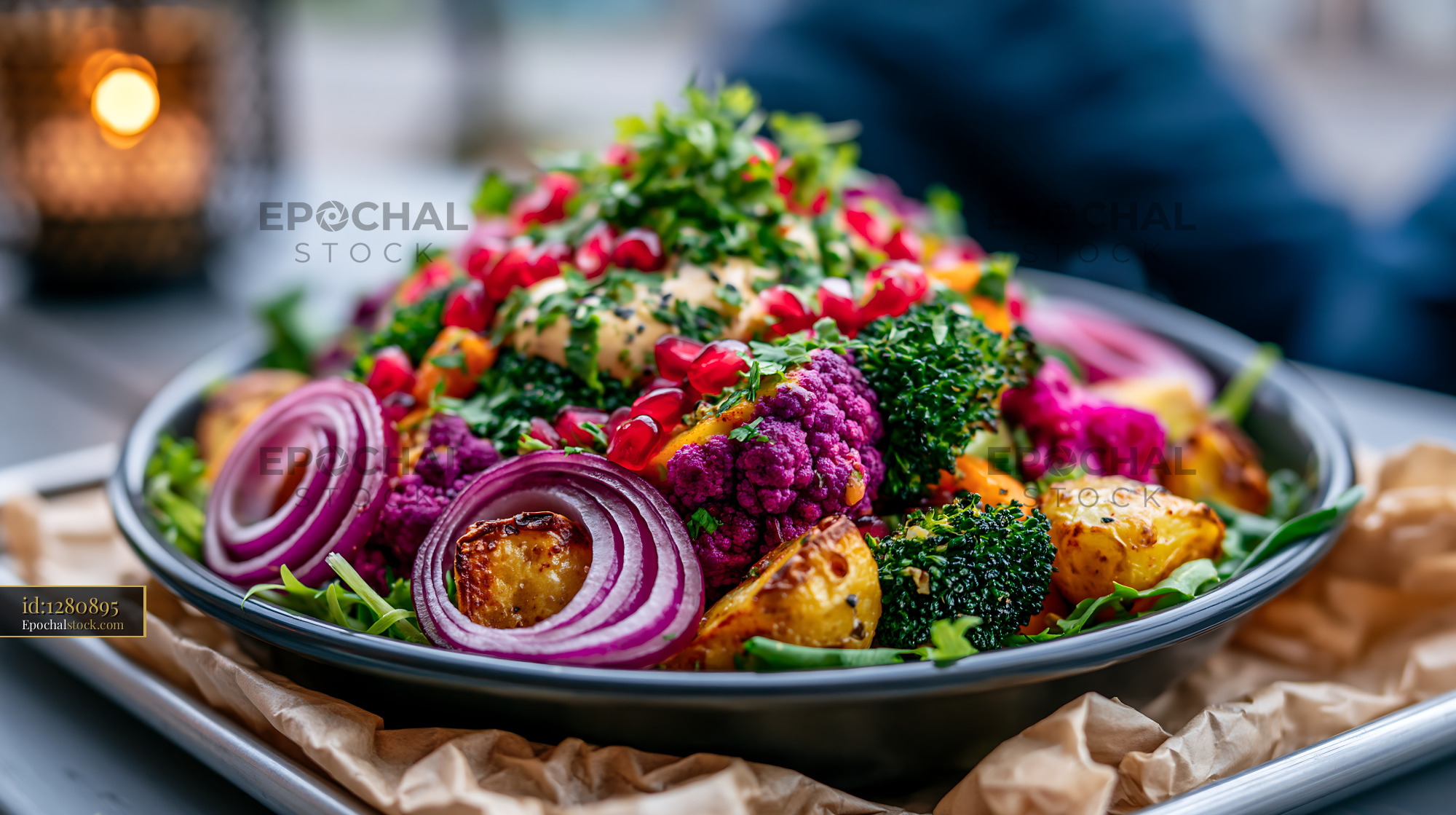 Watermarked full-resolution preview of Colorful vegetable salad with fresh ingredients on rustic table