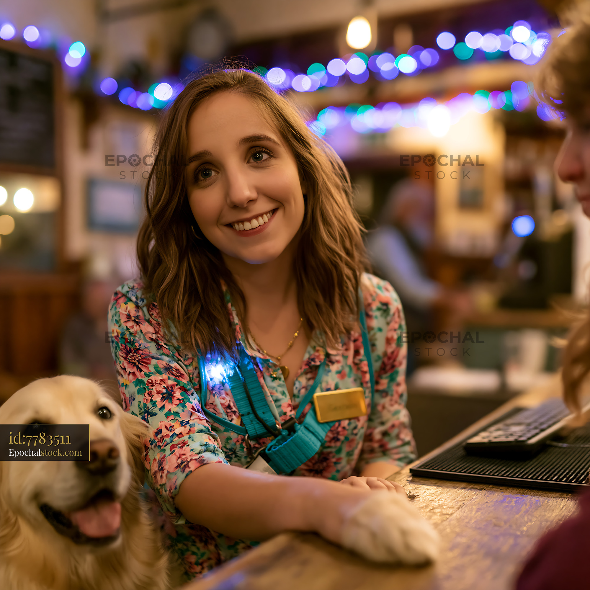 Watermarked full-resolution preview of Friendly staff member interacts with customers at a cozy pub