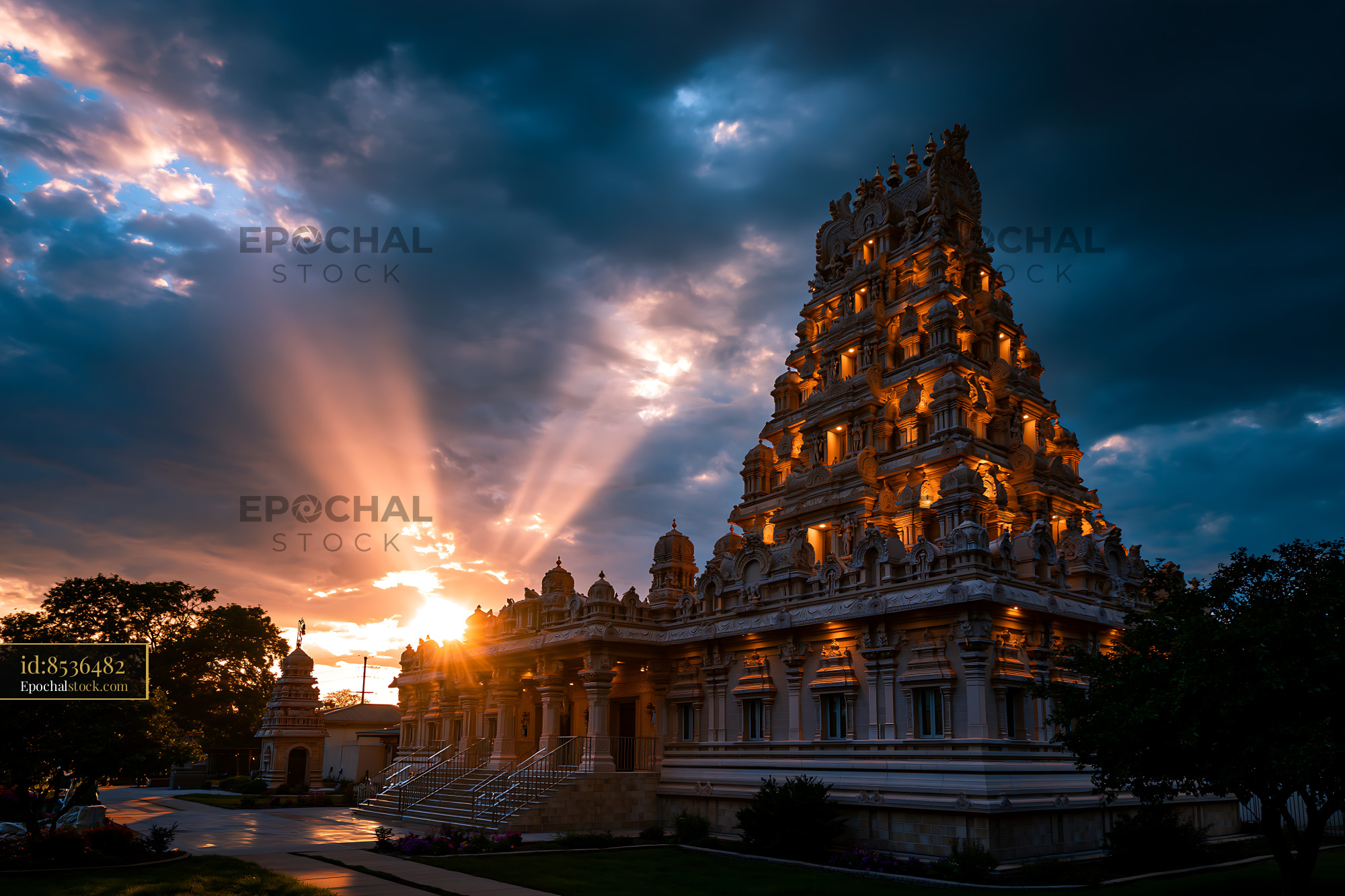 Watermarked full-resolution preview of Sunset view of a temple with dramatic sky in the background