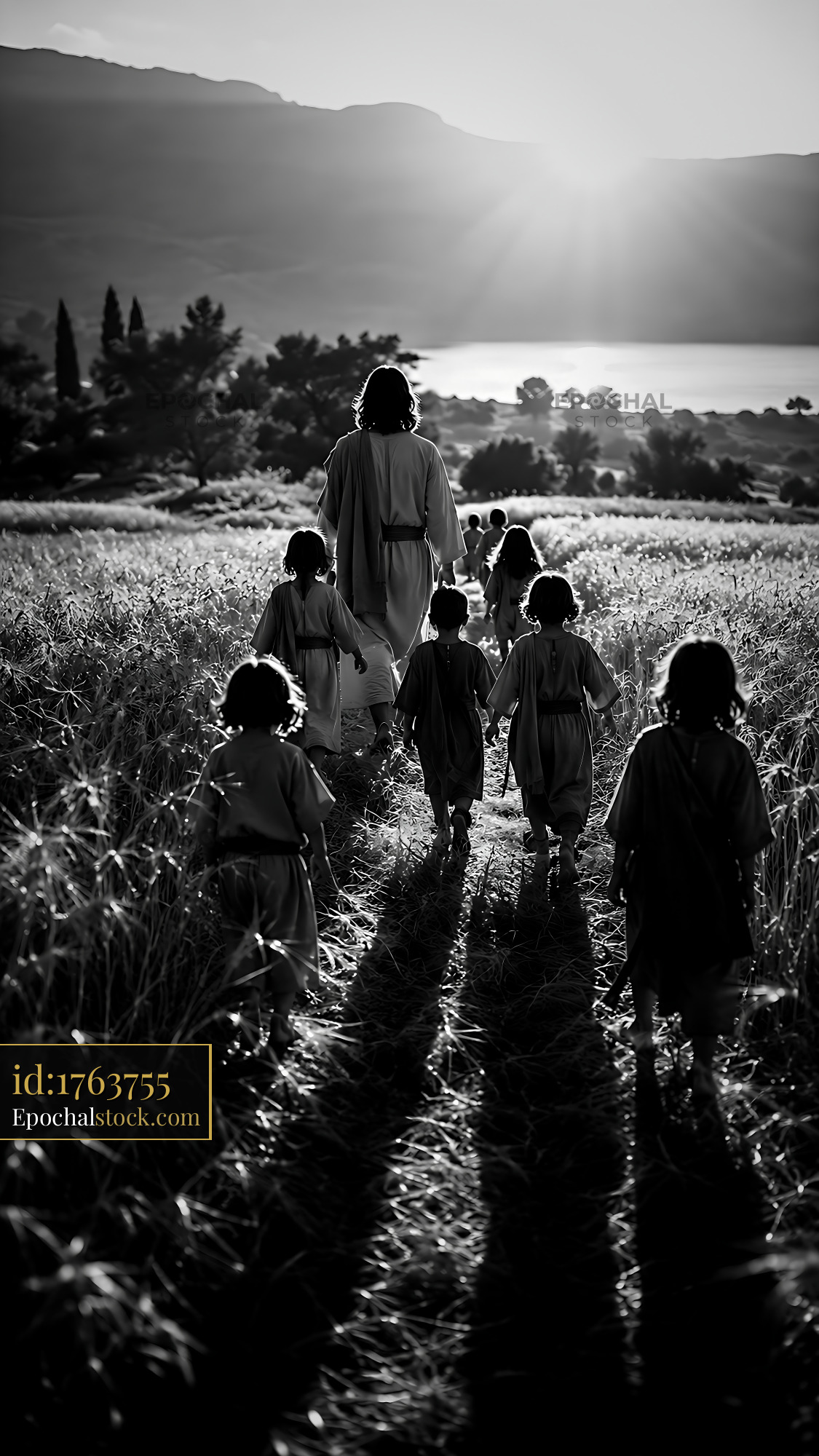 Watermarked full-resolution preview of Walking through a field with children at sunset