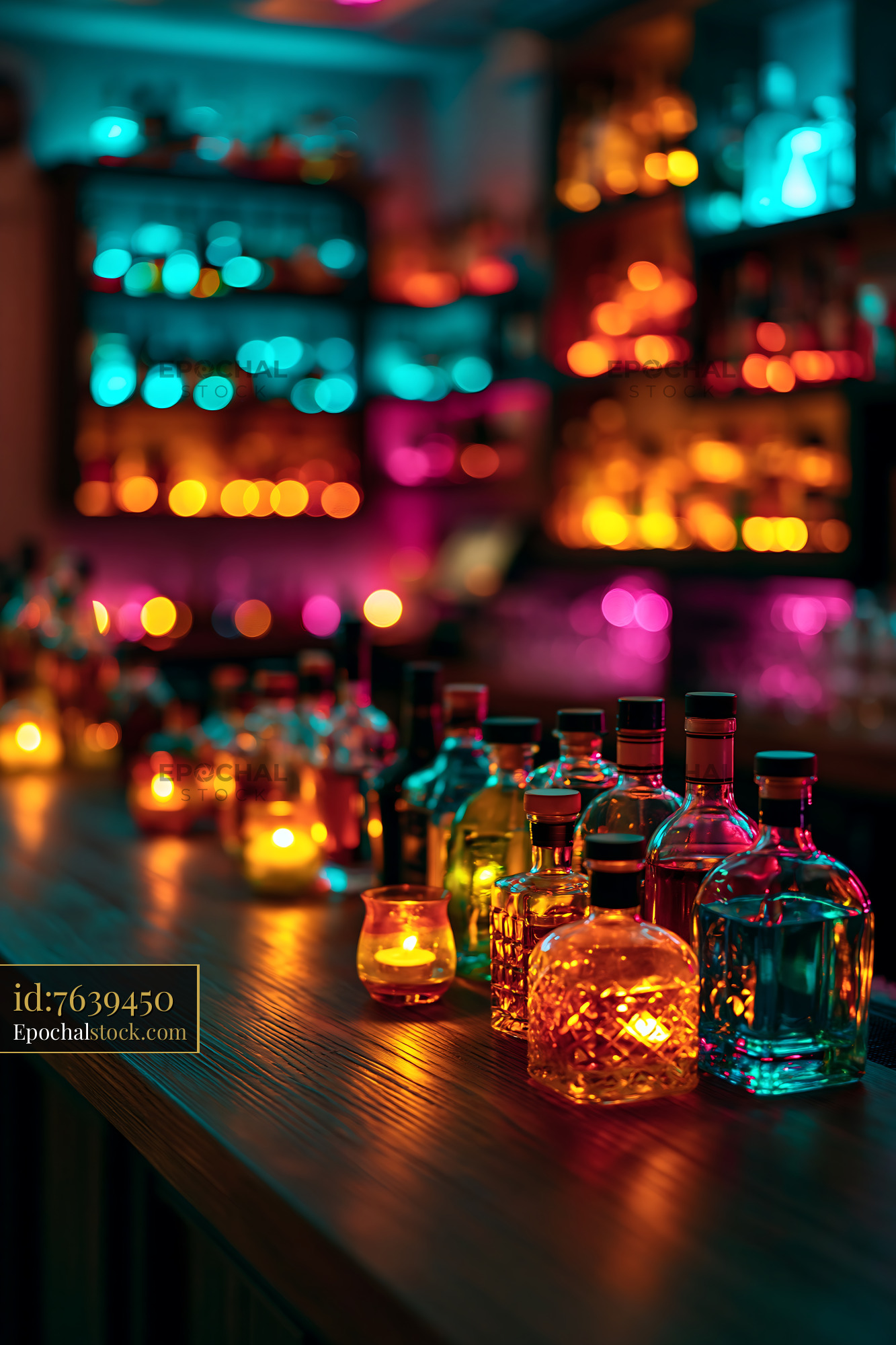 Watermarked full-resolution preview of Colorful bottles and glasses illuminated at a bar