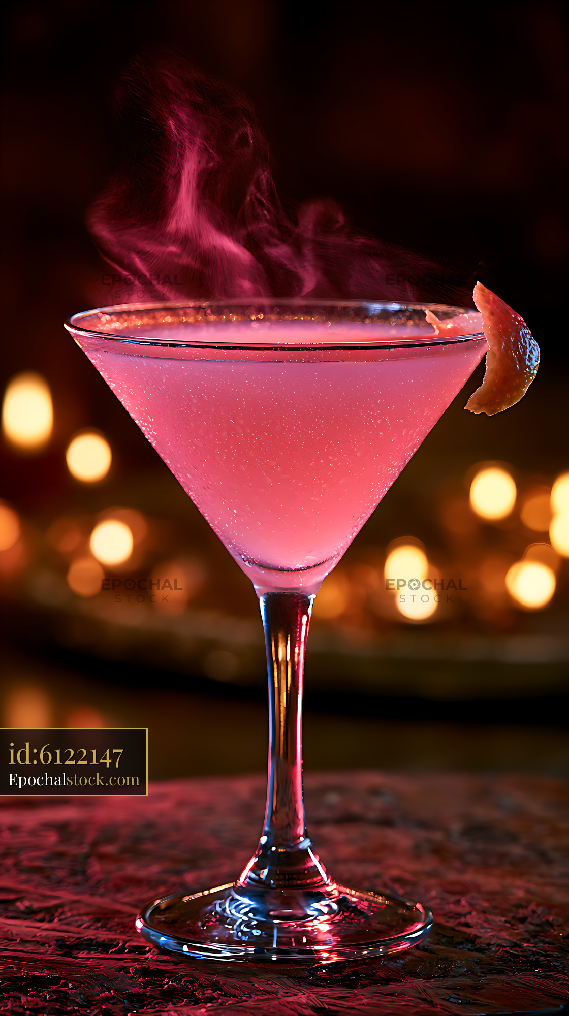 Watermarked full-resolution preview of Vivid pink cocktail with citrus peel and atmospheric smoke