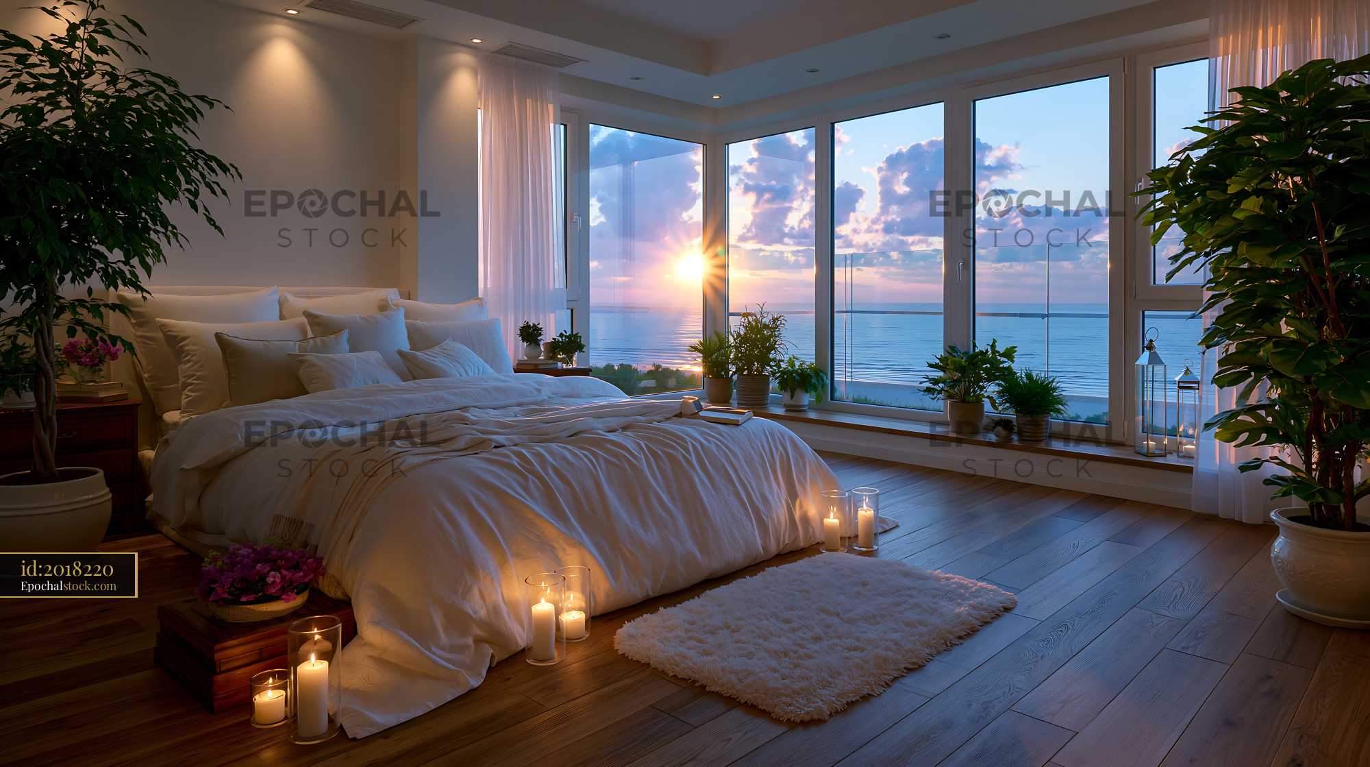 Watermarked full-resolution preview of Cozy bedroom with large windows and sunset view over the water