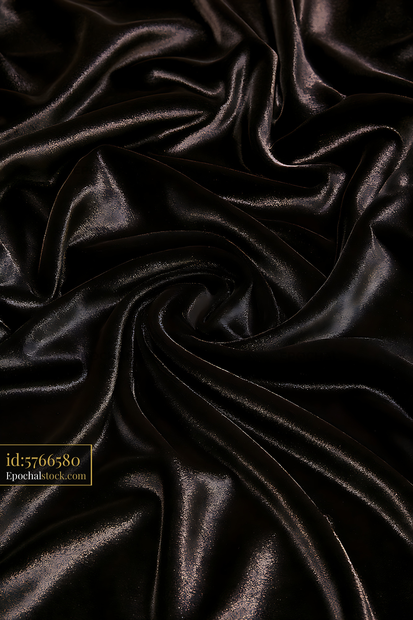 Watermarked full-resolution preview of Glossy black textile with flowing folds