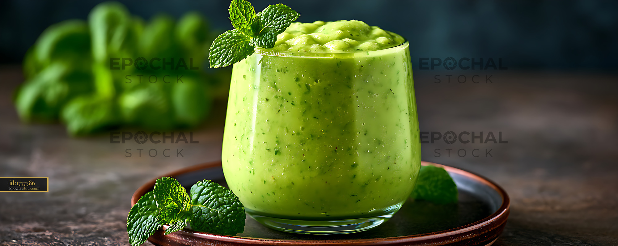 Watermarked full-resolution preview of Fresh green smoothie garnished with mint
