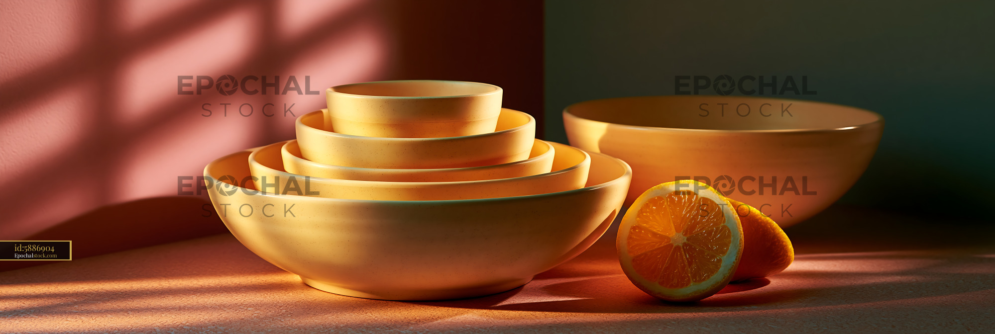 Watermarked full-resolution preview of Bowl set with oranges on a table in warm light