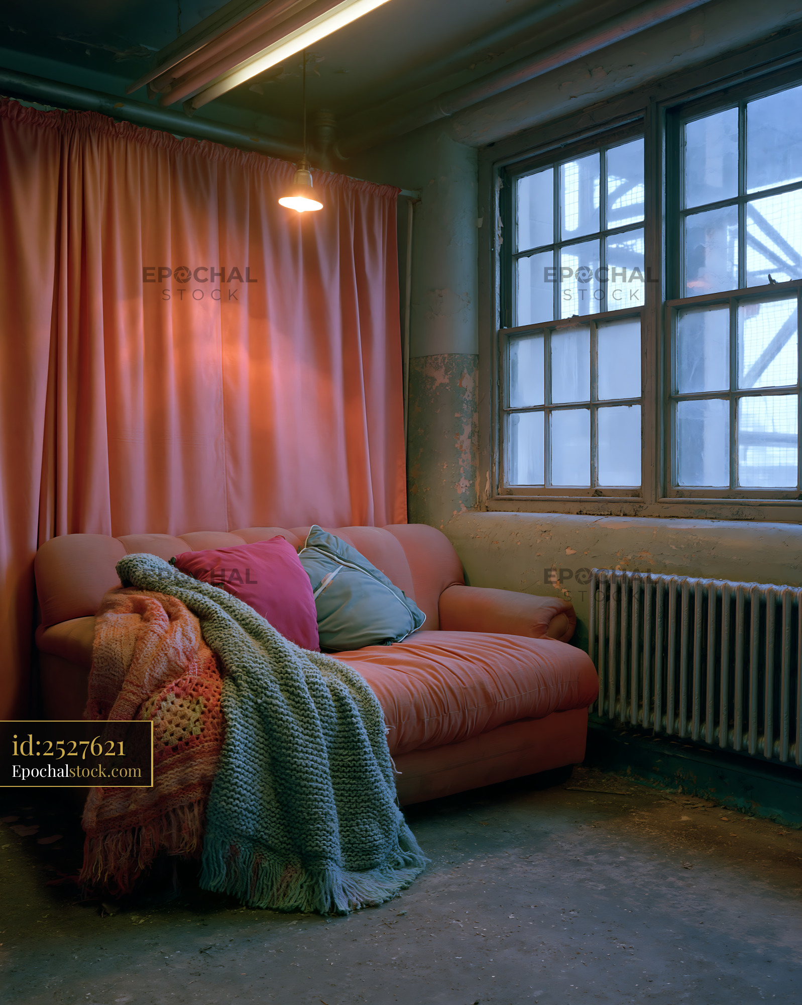 Watermarked full-resolution preview of Living room with a sofa and decorative pillows near a window