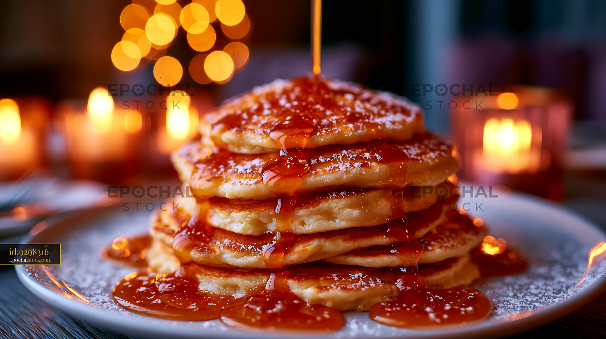 Watermarked full-resolution preview of Pancakes stacked high with syrup and decorative candles