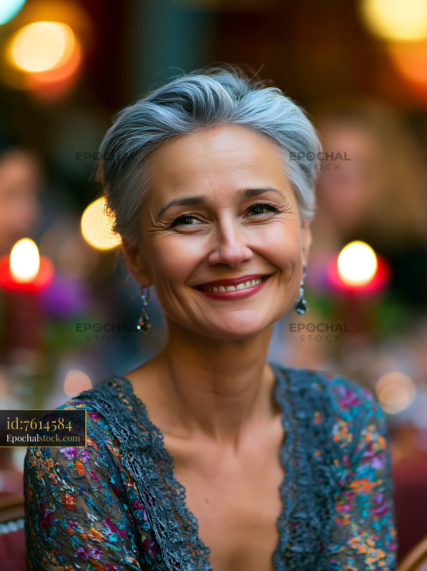 Watermarked full-resolution preview of Smiling woman with gray hair at a festive gathering