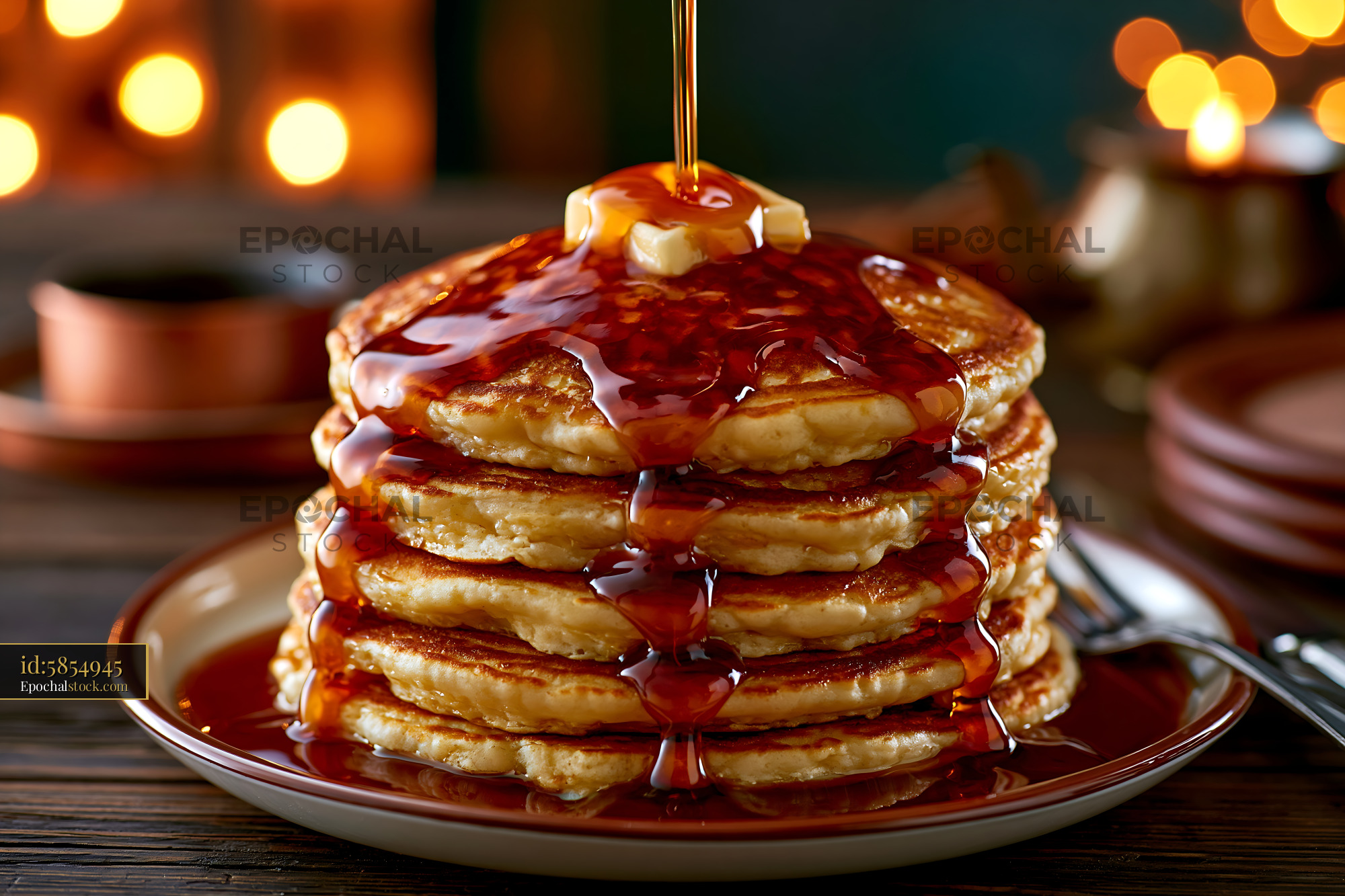 Watermarked full-resolution preview of Stack of pancakes with syrup and butter on a plate