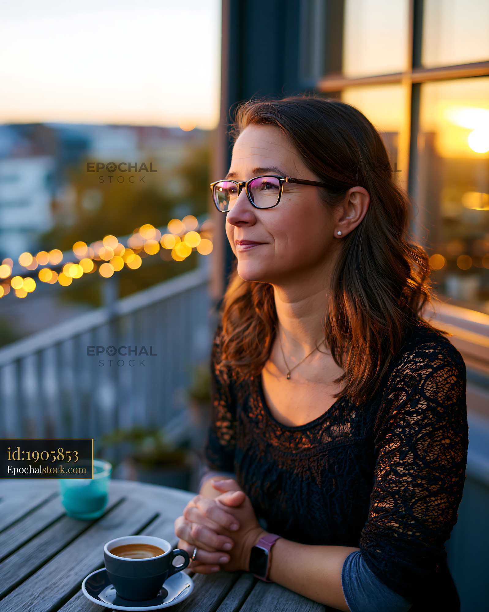 Watermarked full-resolution preview of Evening coffee on a balcony with city lights in the background