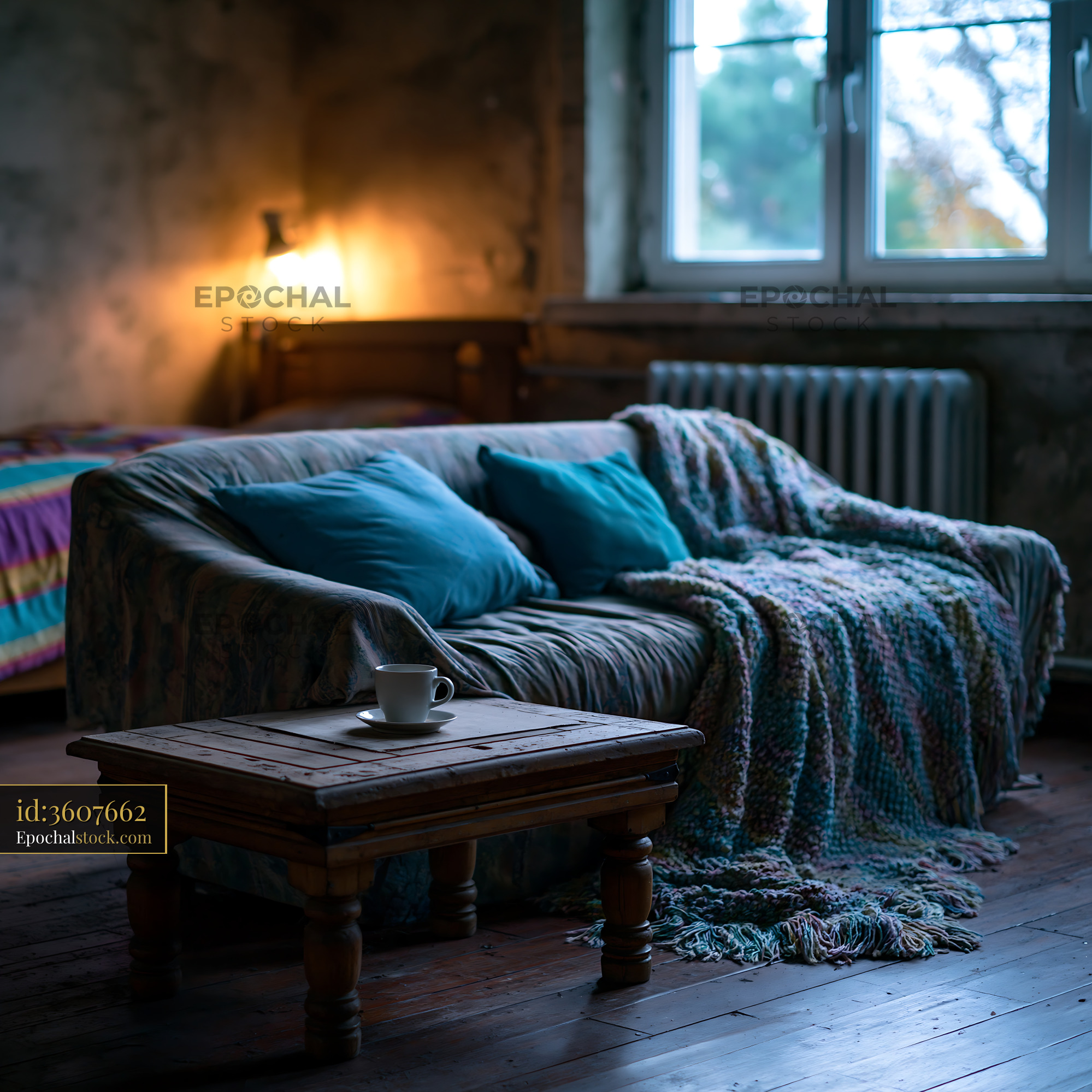 Watermarked full-resolution preview of Cozy living room with a sofa and coffee cup on a table