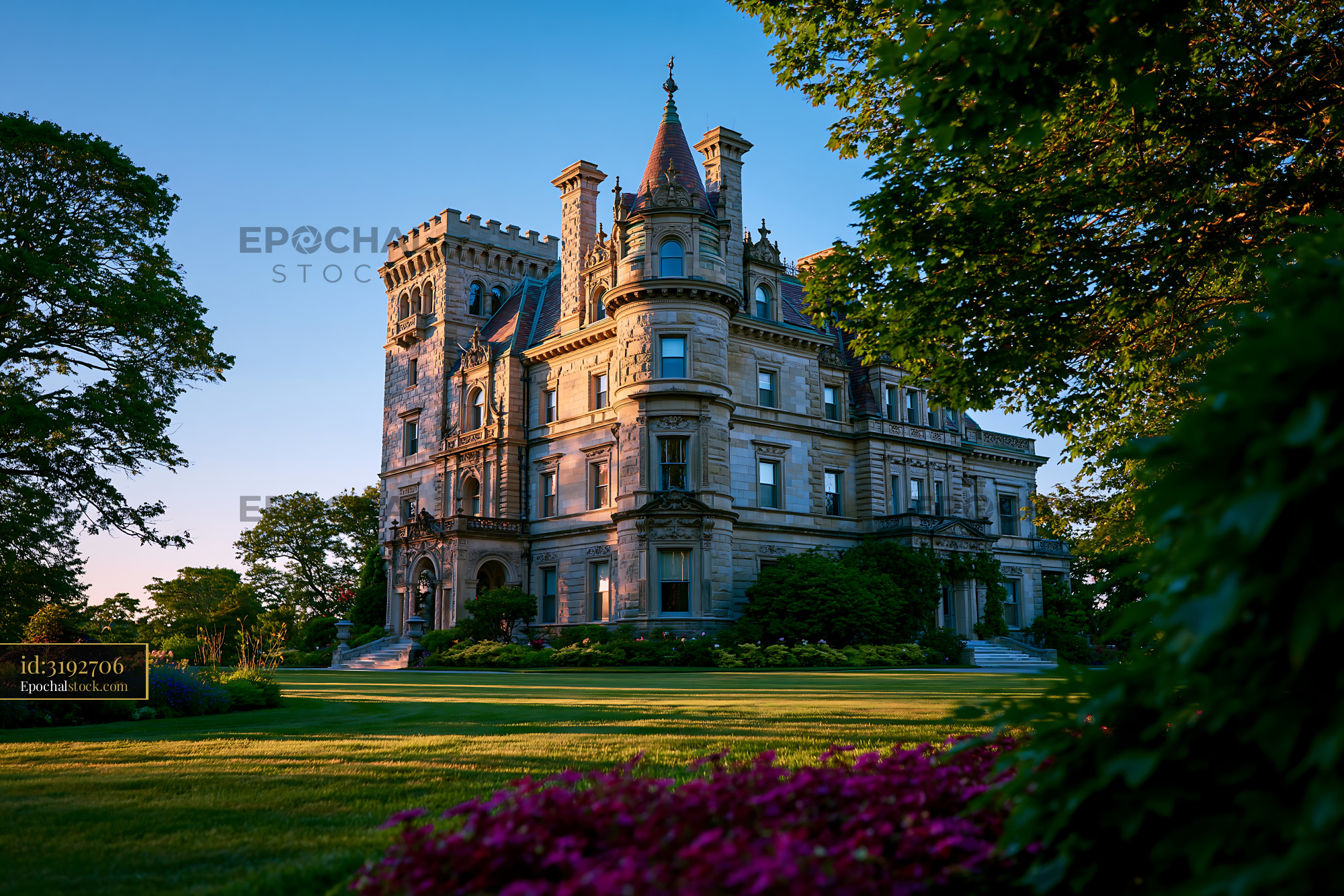 Watermarked full-resolution preview of Historic mansion with large garden in sunlight