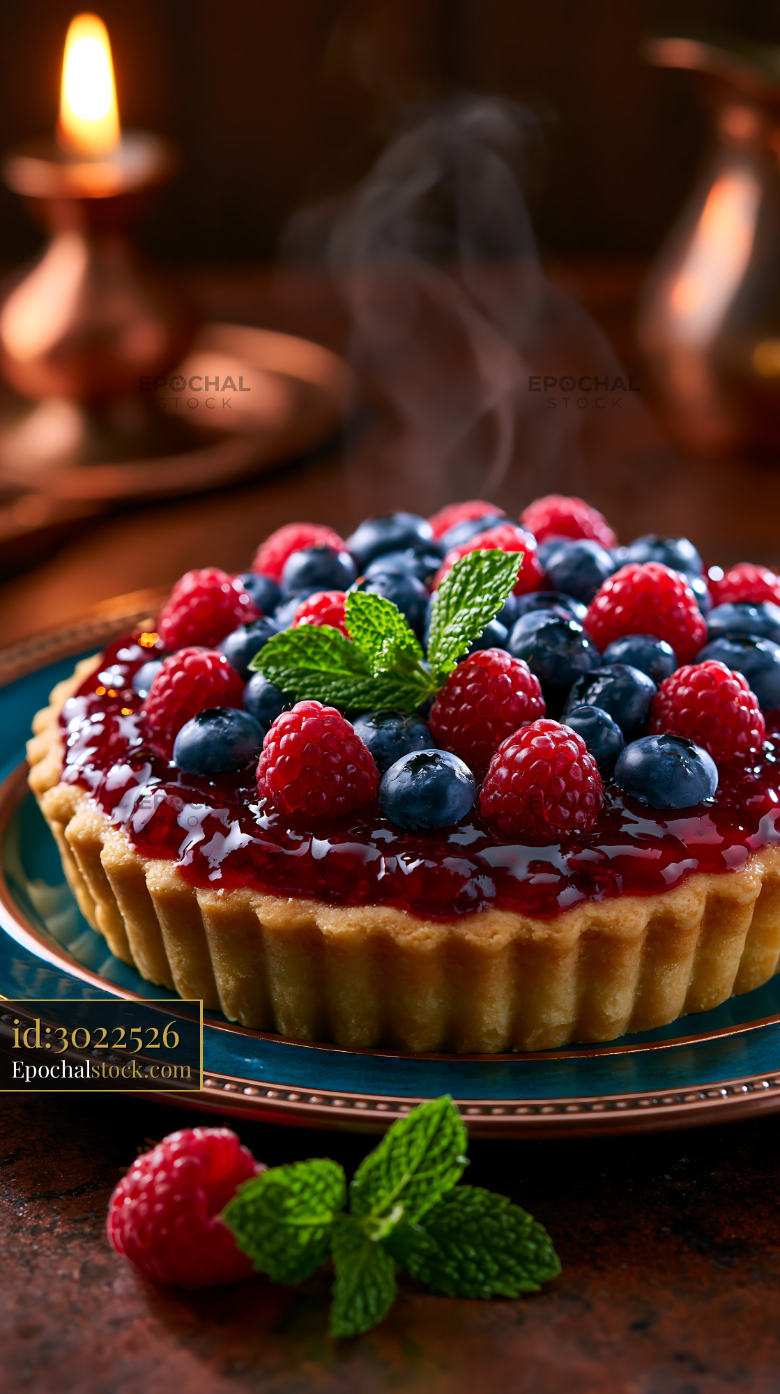 Watermarked full-resolution preview of Close-up berry tart with fresh fruit and mint