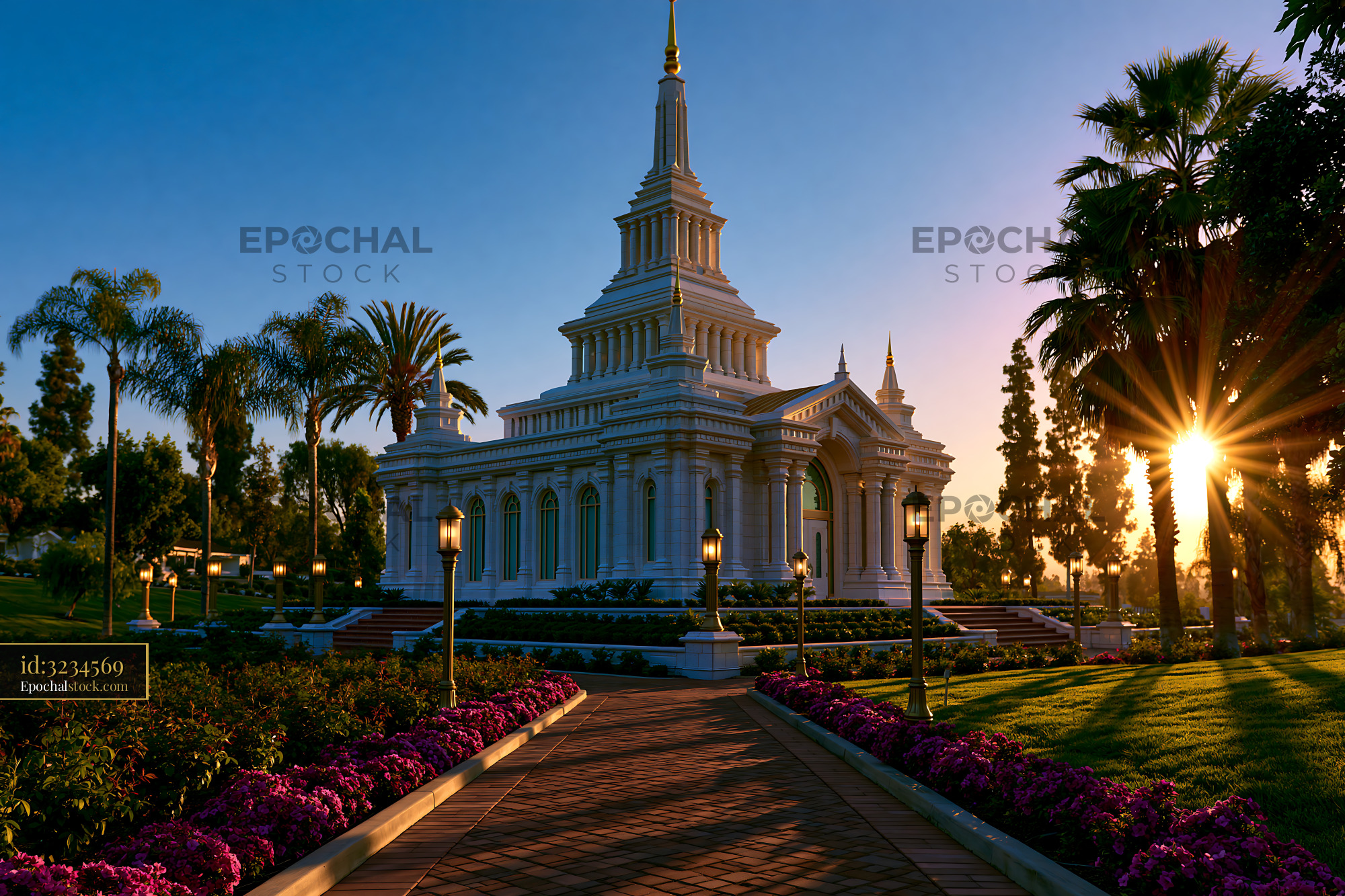 Watermarked full-resolution preview of Beautiful building with sunset and flowers in a park