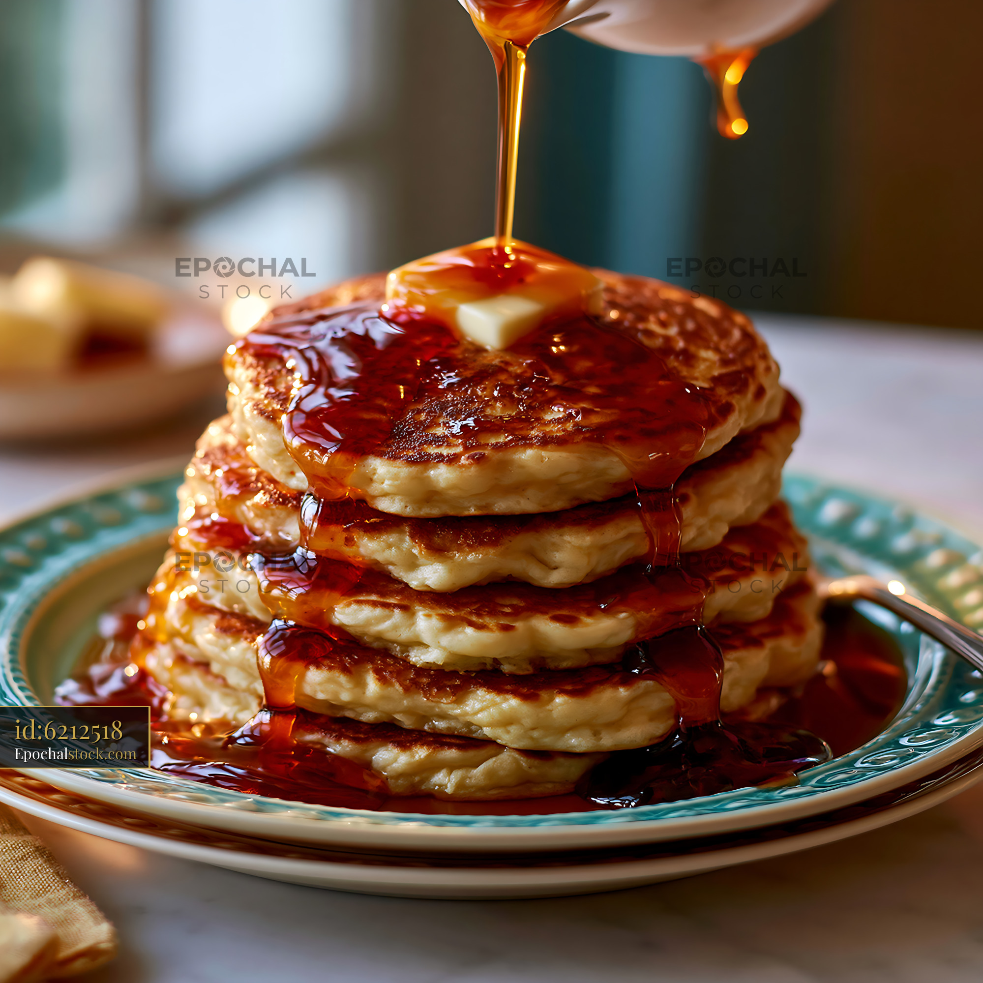 Watermarked full-resolution preview of Pancakes stacked on a plate with syrup and butter on top