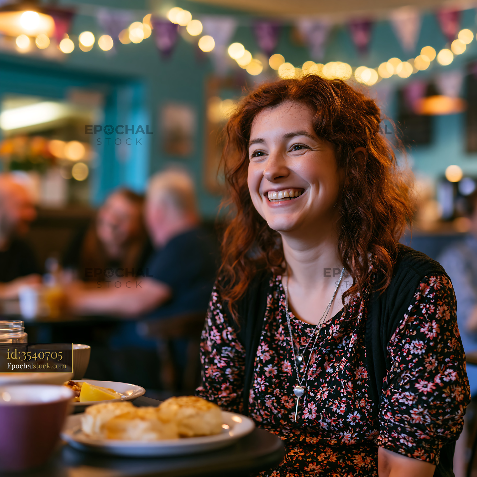 Watermarked full-resolution preview of Woman smiling while dining in a busy restaurant during the evening