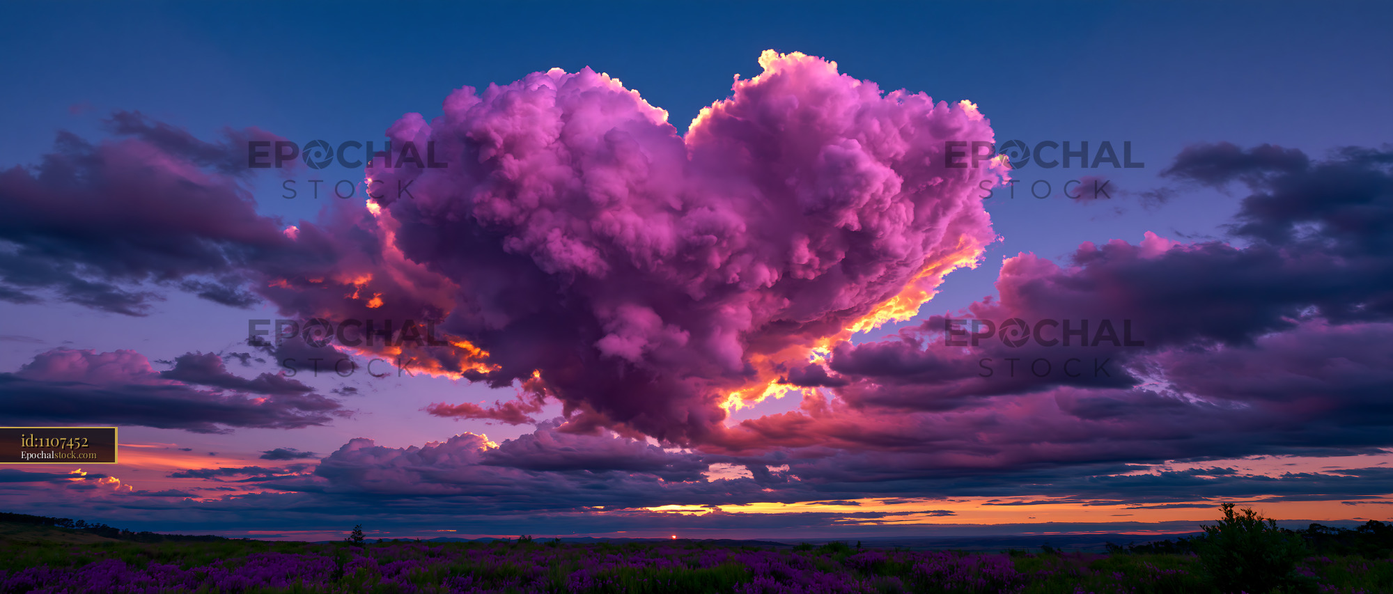 Watermarked full-resolution preview of Colorful clouds shaped like a heart during sunset