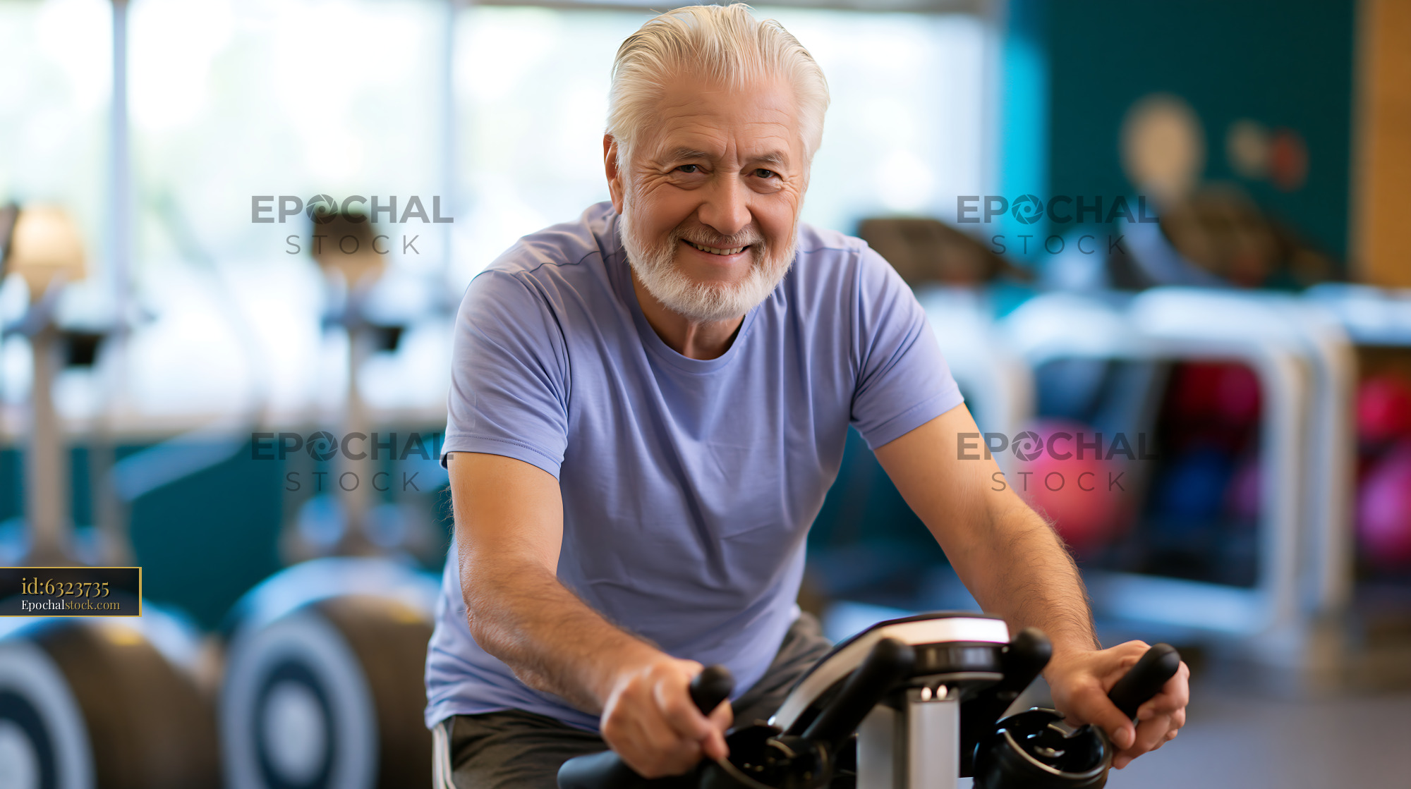 Watermarked full-resolution preview of Senior man exercising on stationary bike at gym