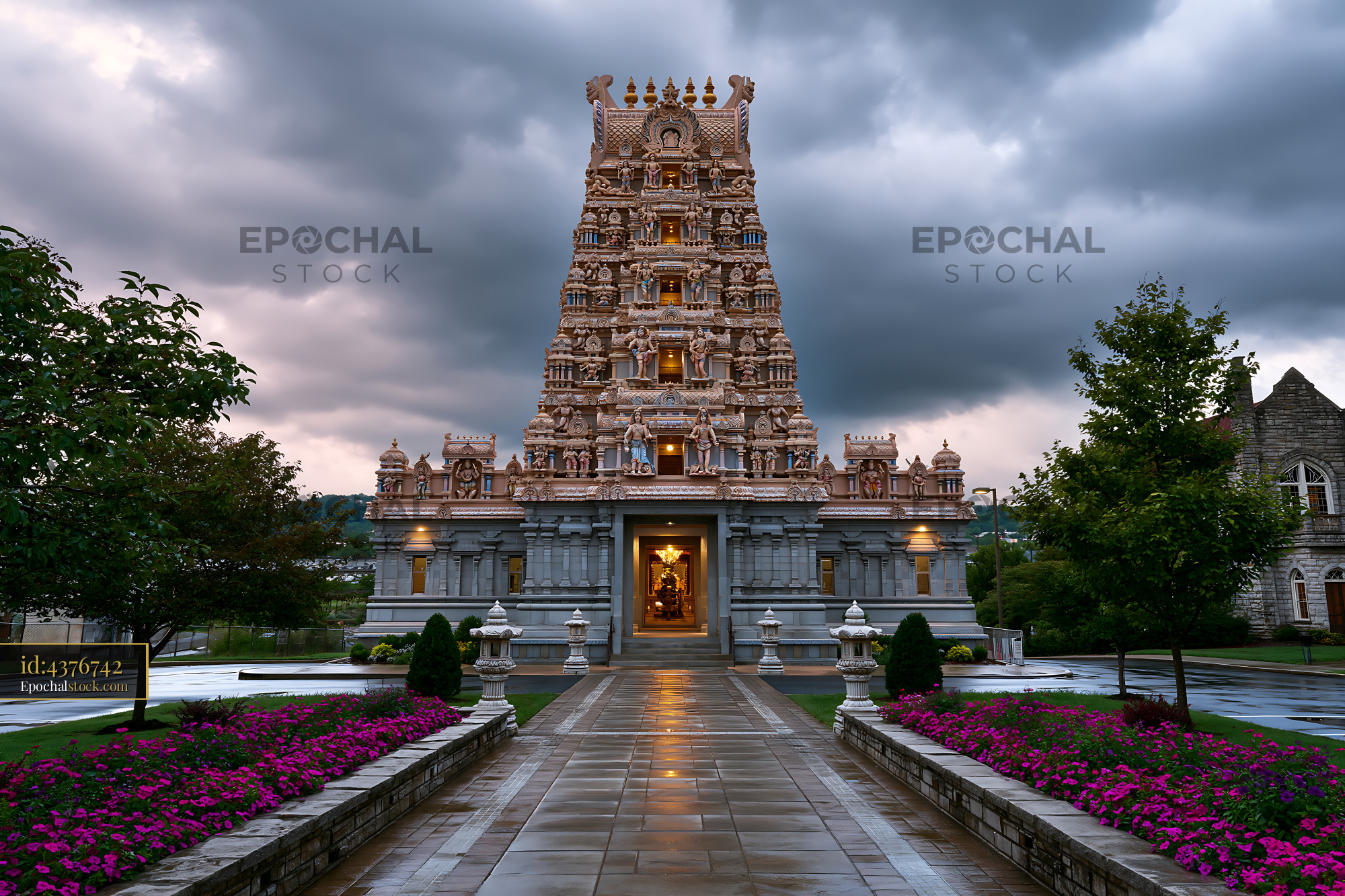 Watermarked full-resolution preview of Hindu temple with intricate design under a cloudy sky