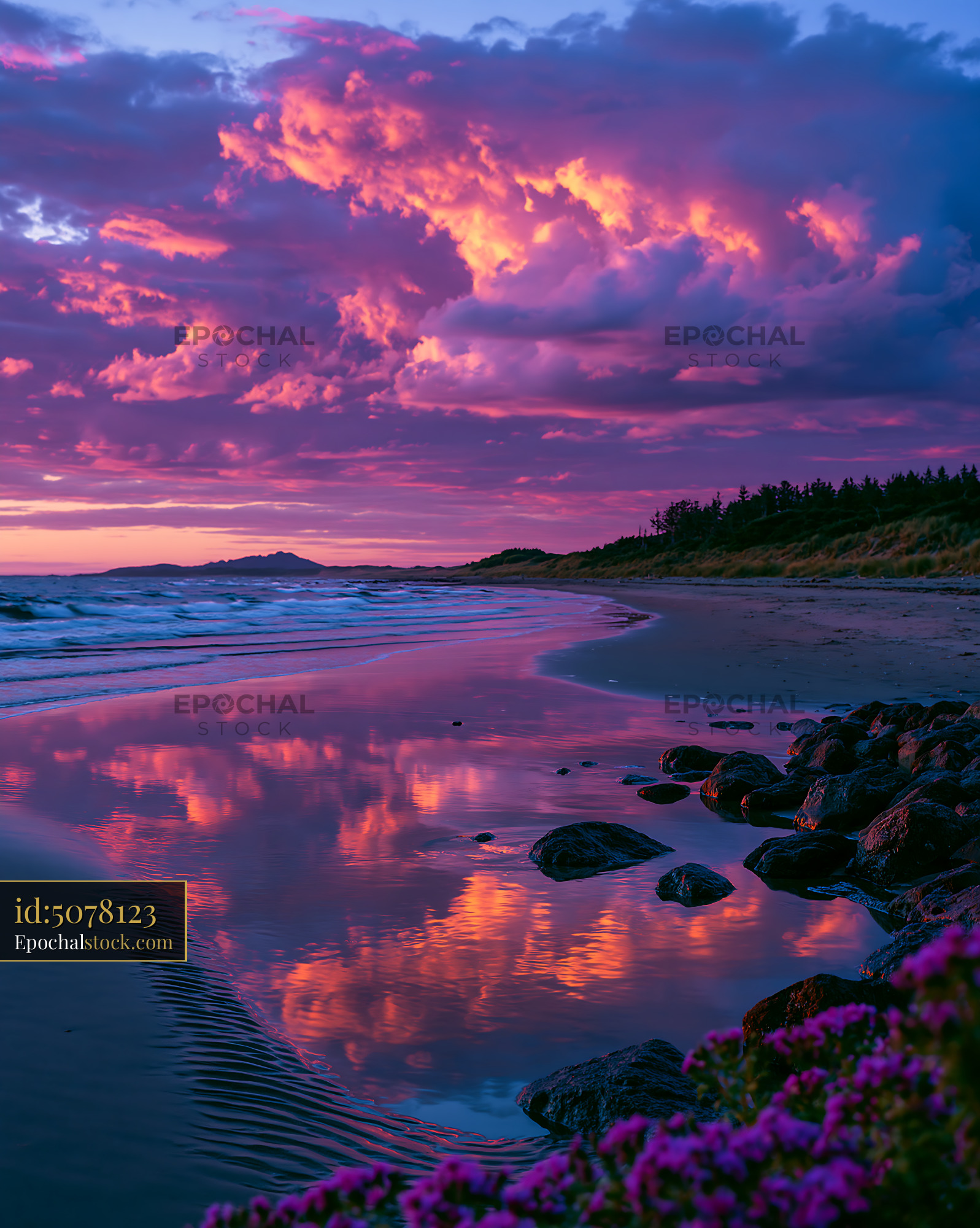 Watermarked full-resolution preview of Colorful clouds over the beach at sunset with reflections in water