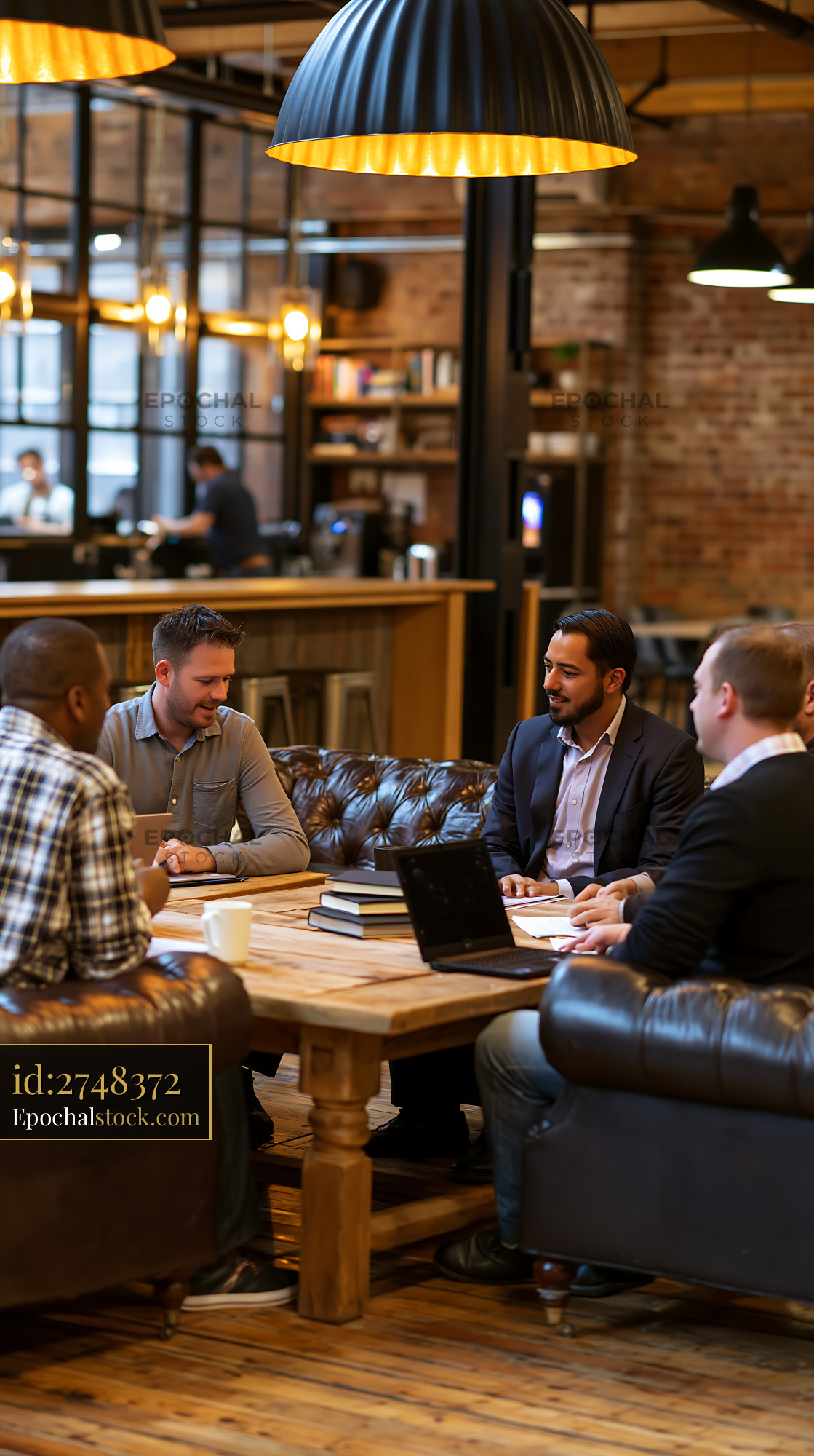Support Group Meeting in a Cafe Setting With Five Men
