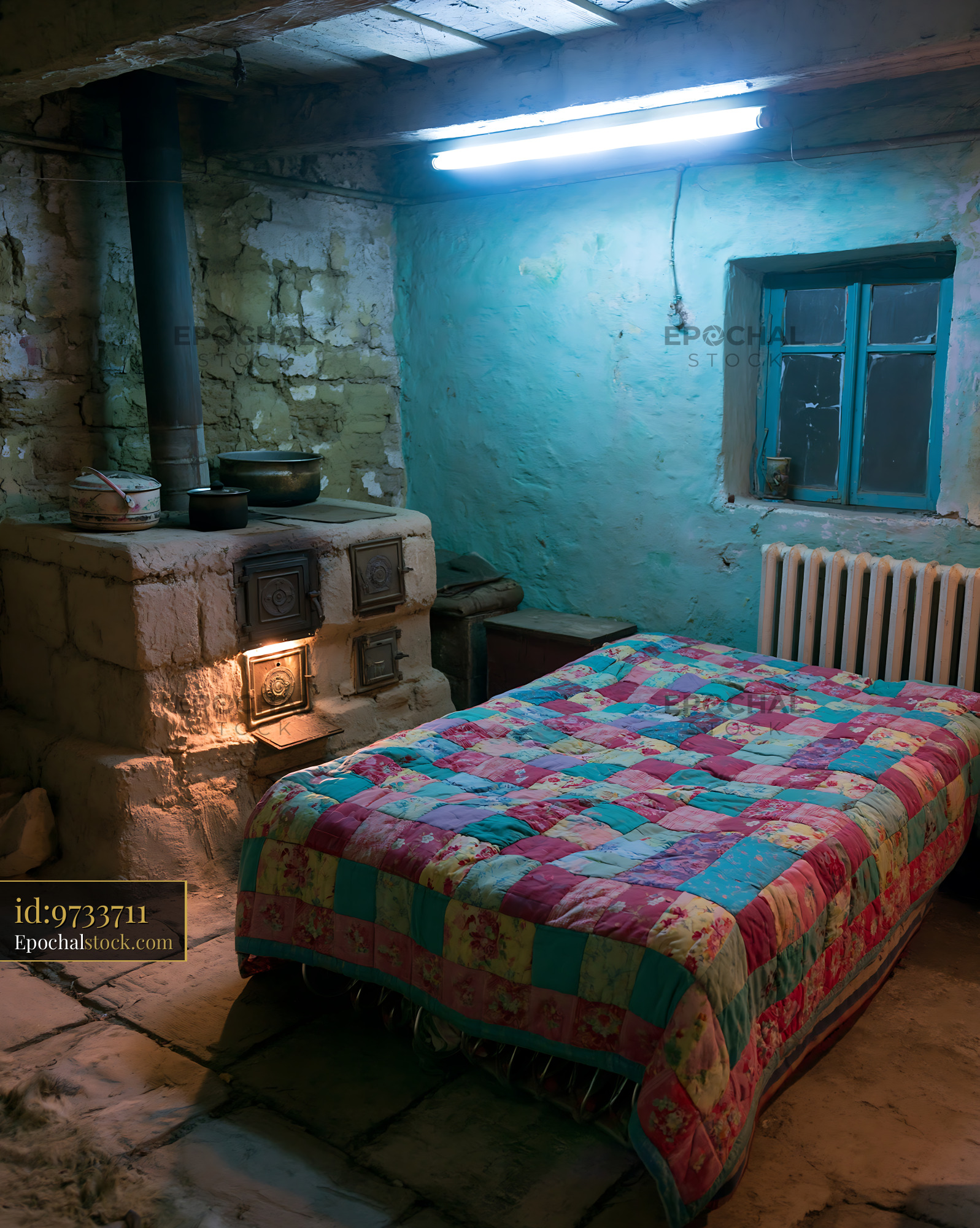 Clay Stove in a Simple Village House Interior With a Bed - stock photo