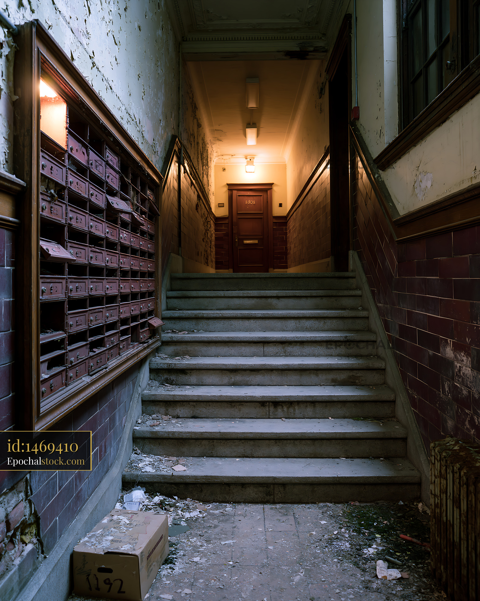 Watermarked full-resolution preview of Stairs leading to a dimly lit hallway with old mailboxes