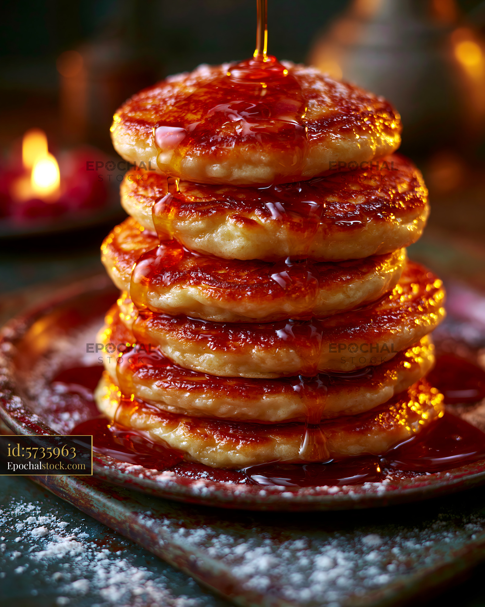 Watermarked full-resolution preview of Syrup-covered pancake stack in warm light