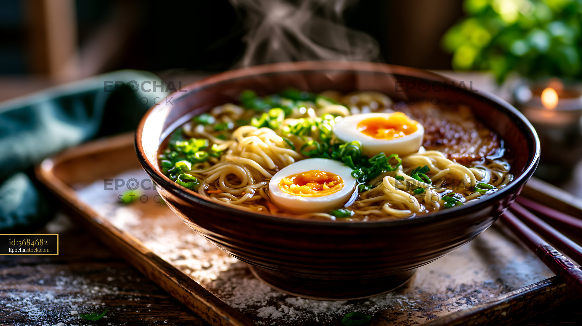 Bowl of Steaming Ramen With Soft Egg and Chashu on Wooden Table - stock photo
