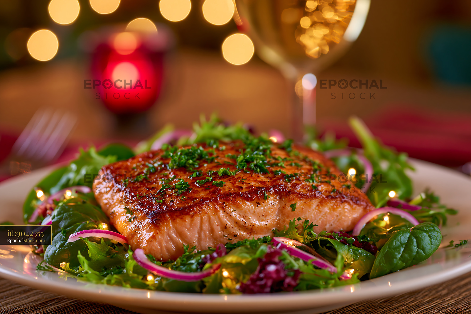 Watermarked full-resolution preview of Grilled salmon on a bed of fresh greens in a cozy dining setting