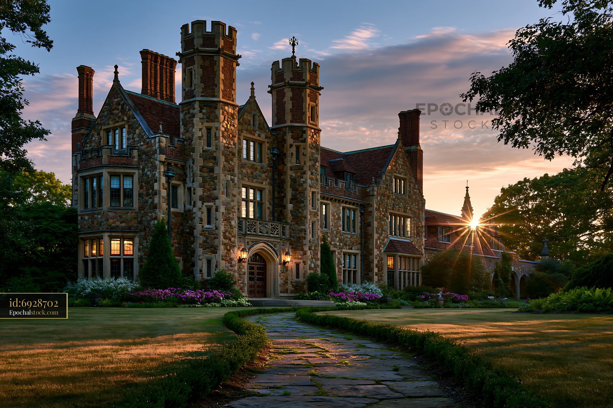 Watermarked full-resolution preview of Historical stone mansion at sunset with clear sky