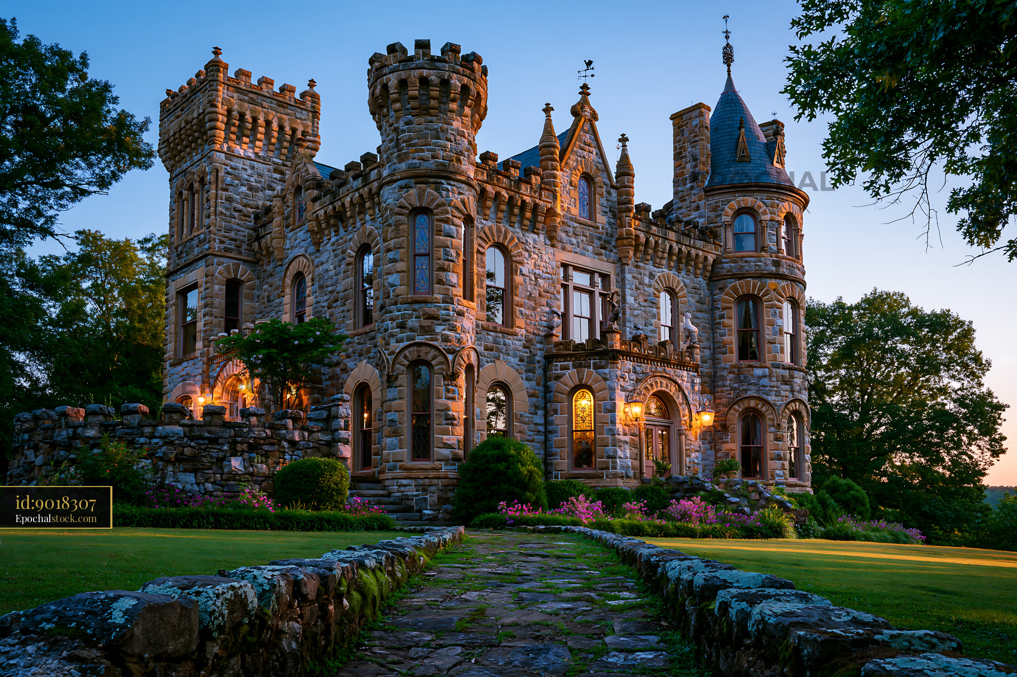 Watermarked full-resolution preview of Grand stone castle surrounded by gardens at dusk