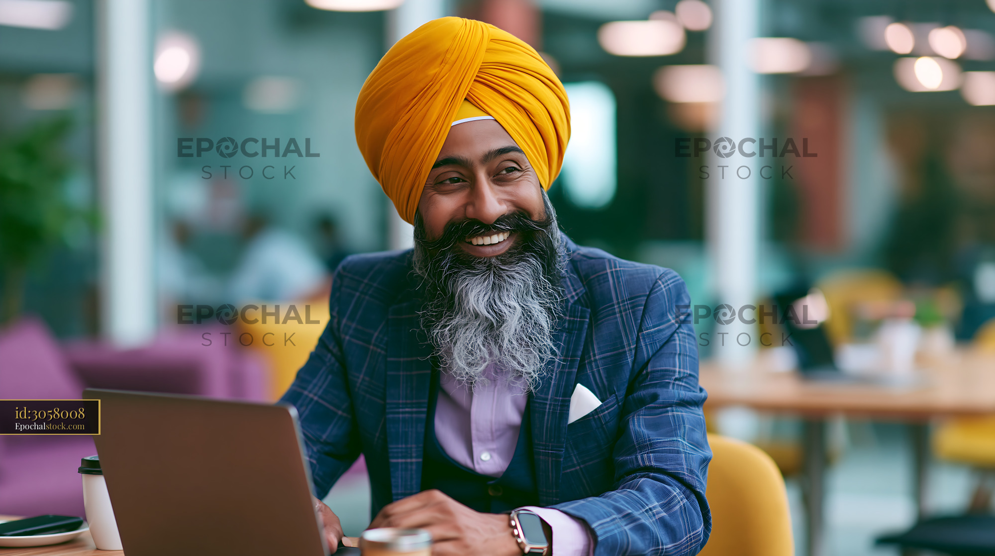Watermarked full-resolution preview of Man using laptop in office with warm colors and modern design