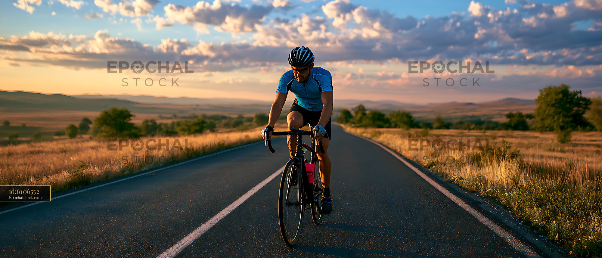 Watermarked full-resolution preview of Road cyclist on a country road in evening light