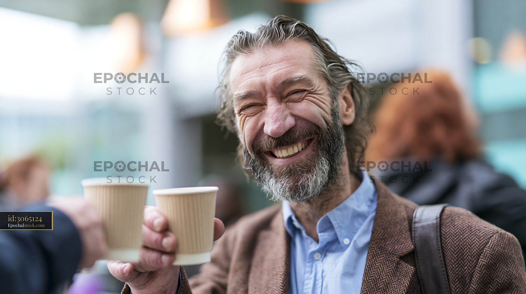 Watermarked full-resolution preview of Man celebrating with cups of coffee in a busy urban area
