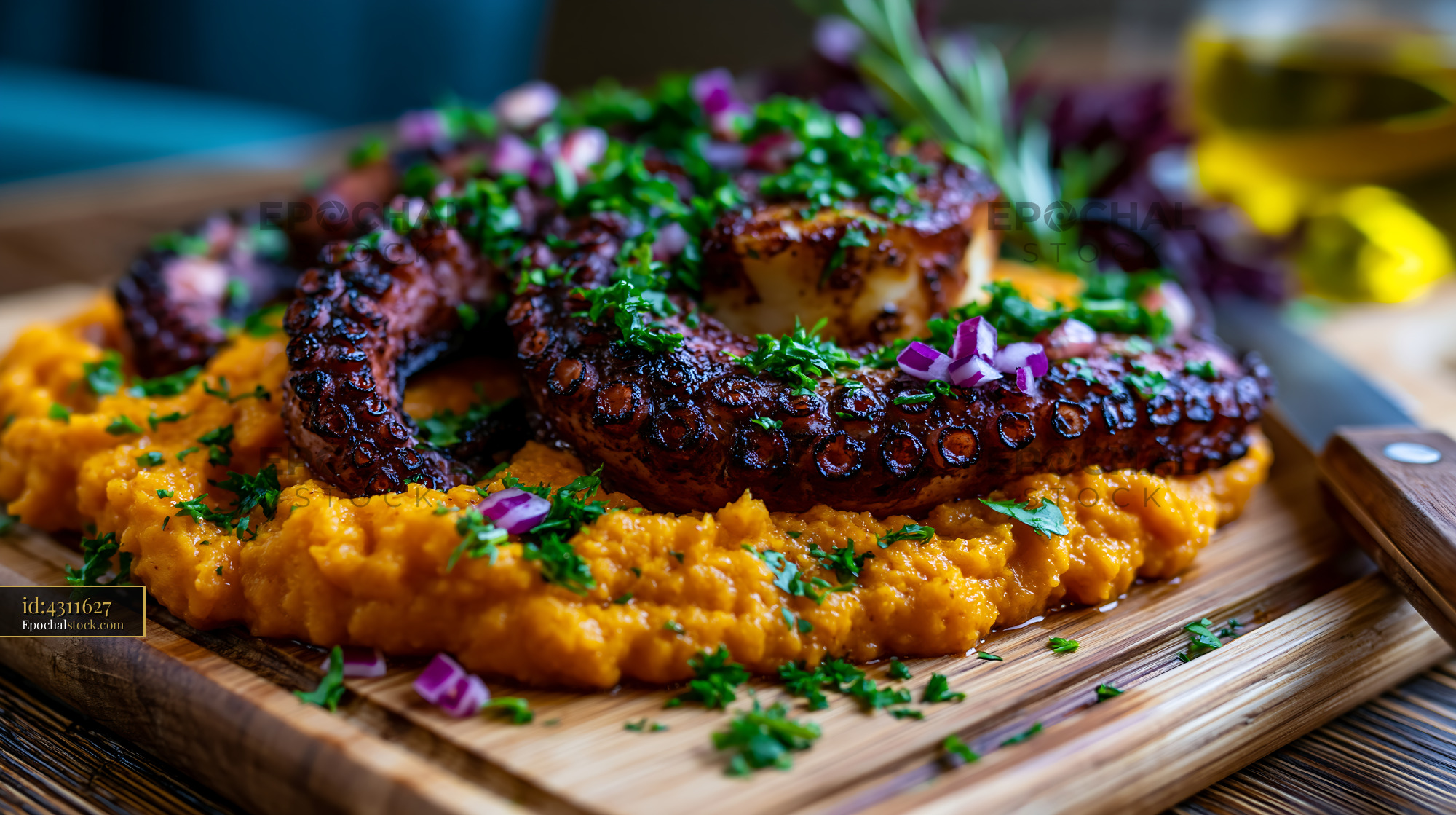 Watermarked full-resolution preview of Grilled octopus served on a bed of mashed sweet potatoes