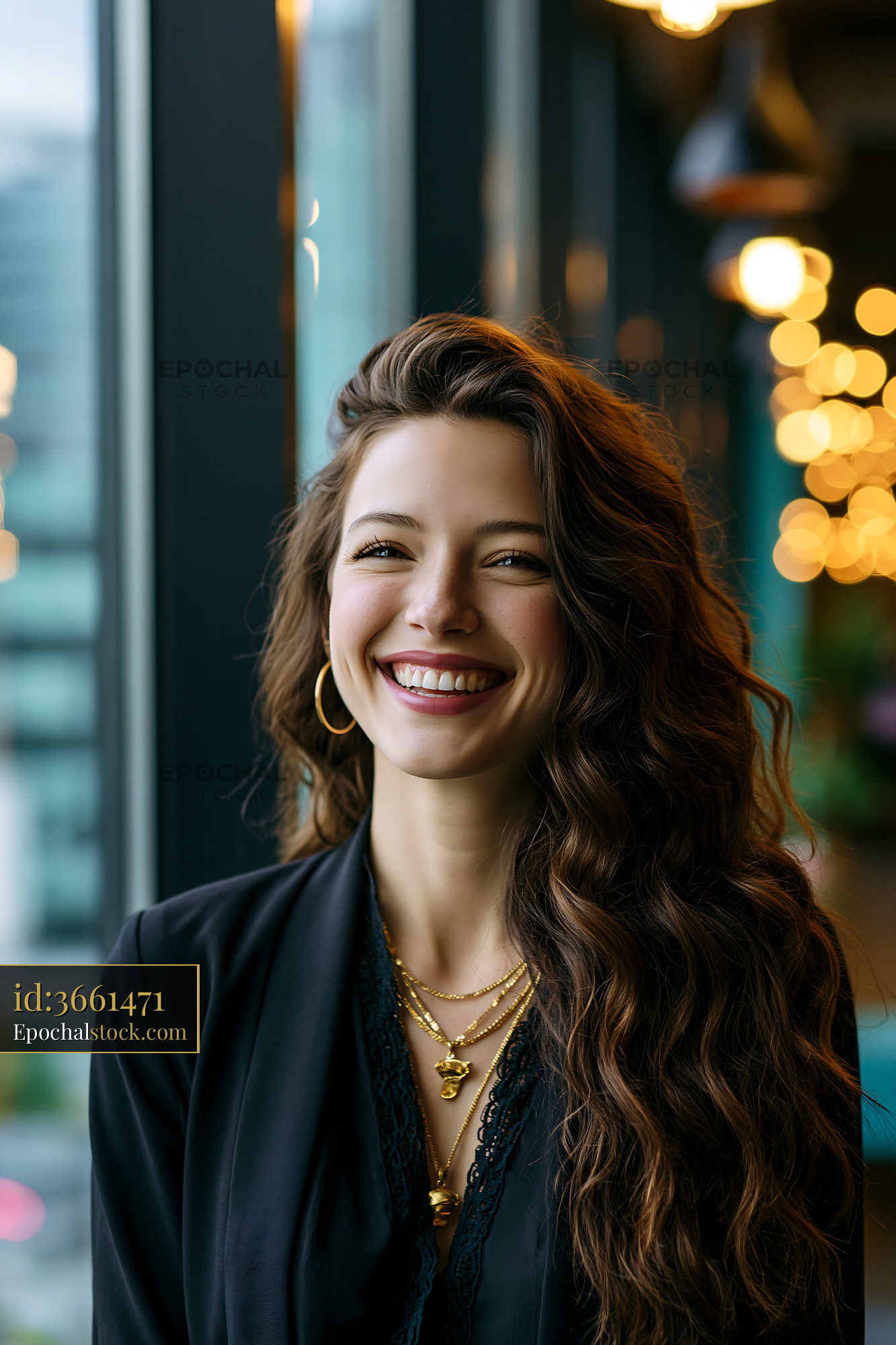 Watermarked full-resolution preview of Woman smiling near window with urban view