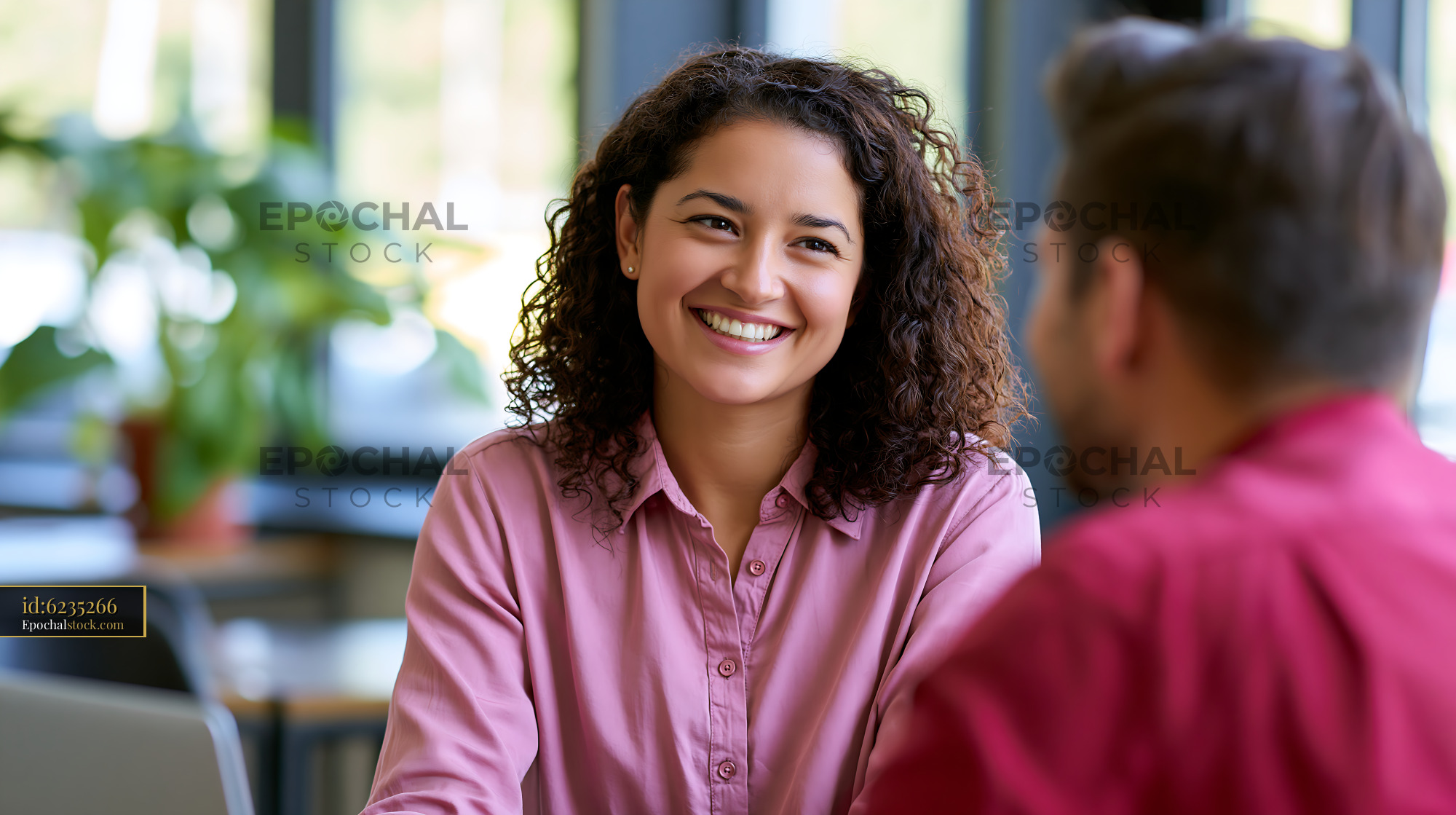 Tax Consultant Engaging With Client in Office Setting - stock photo