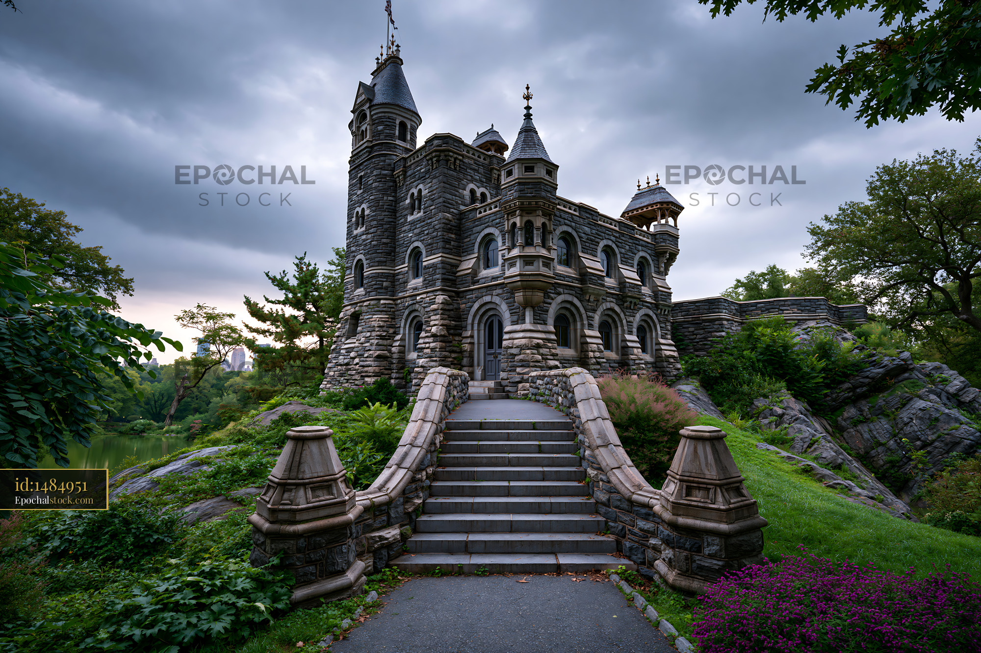 Watermarked full-resolution preview of Historic stone castle surrounded by trees and water