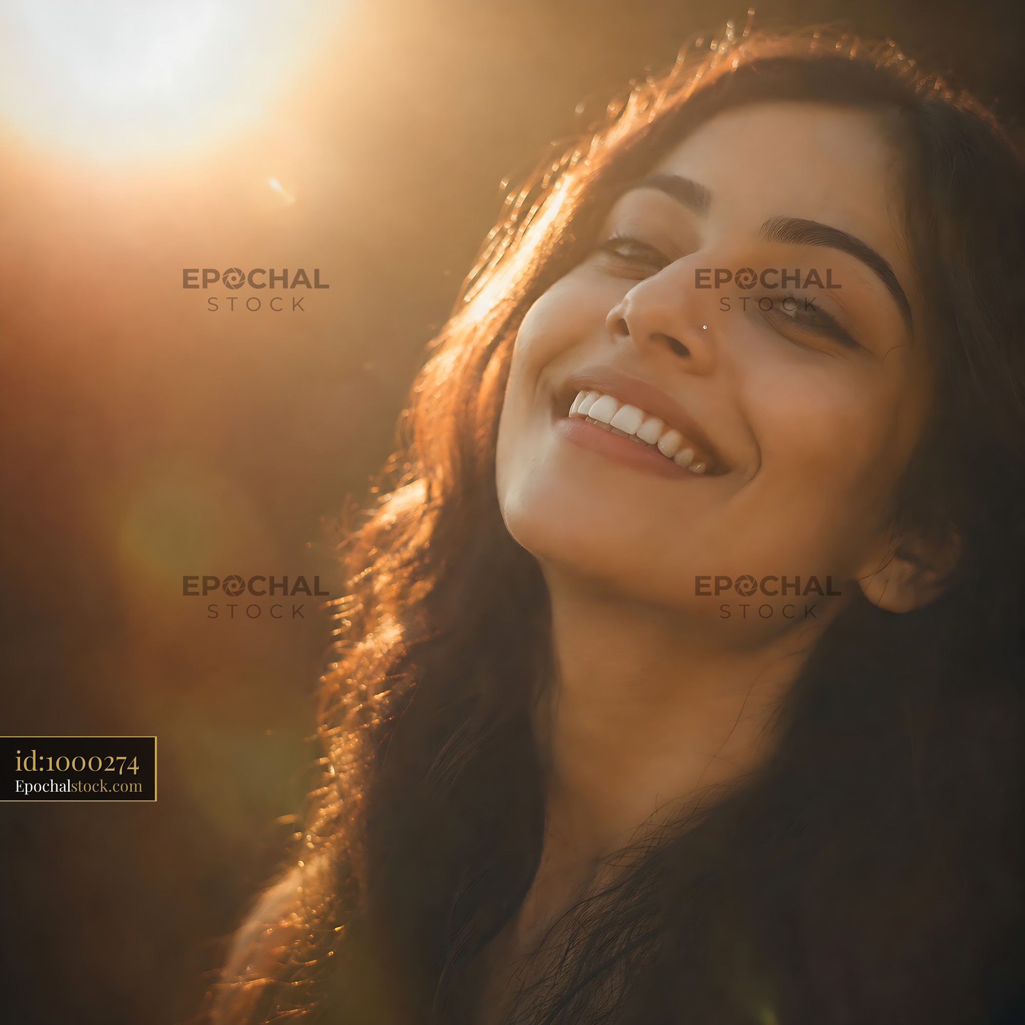 Watermarked full-resolution preview of Woman smiling in sunlight with natural background