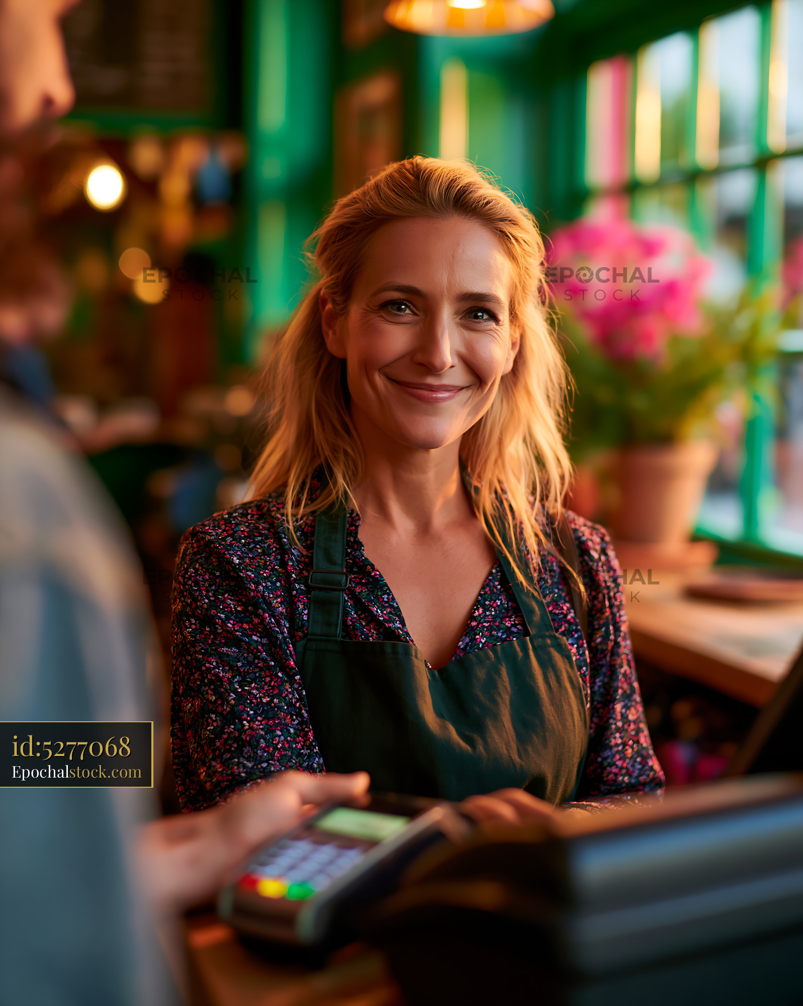 Tax Consultant Assisting Client in a Cozy Setting With Plants - stock photo