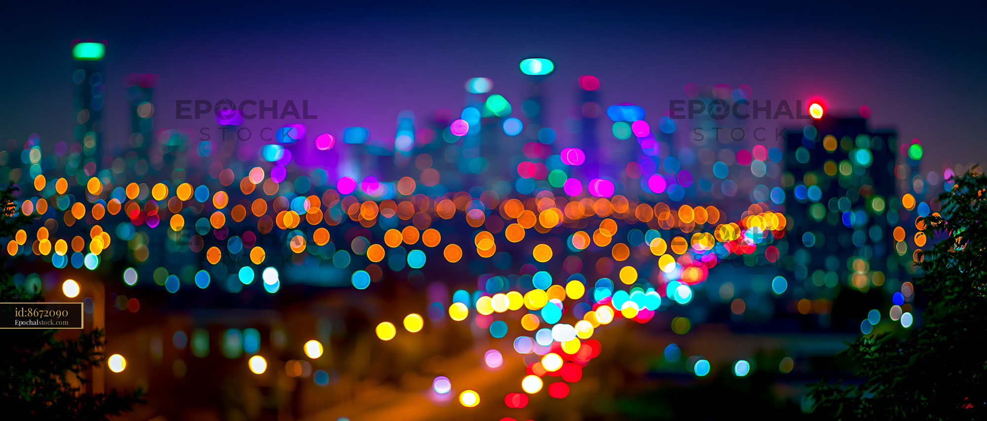 Watermarked full-resolution preview of City skyline at night with bright bokeh lights